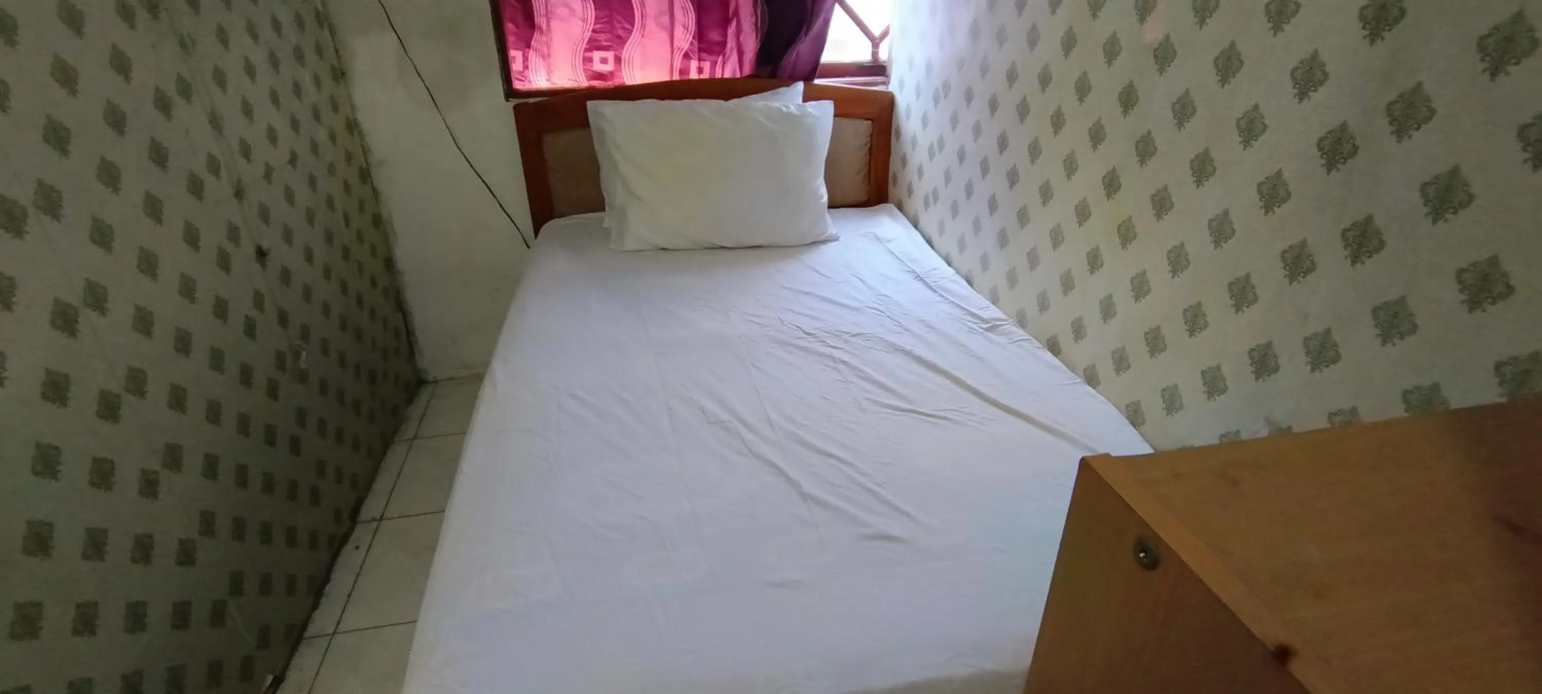 Bedroom in SPOT ON 92338 Karin Kost