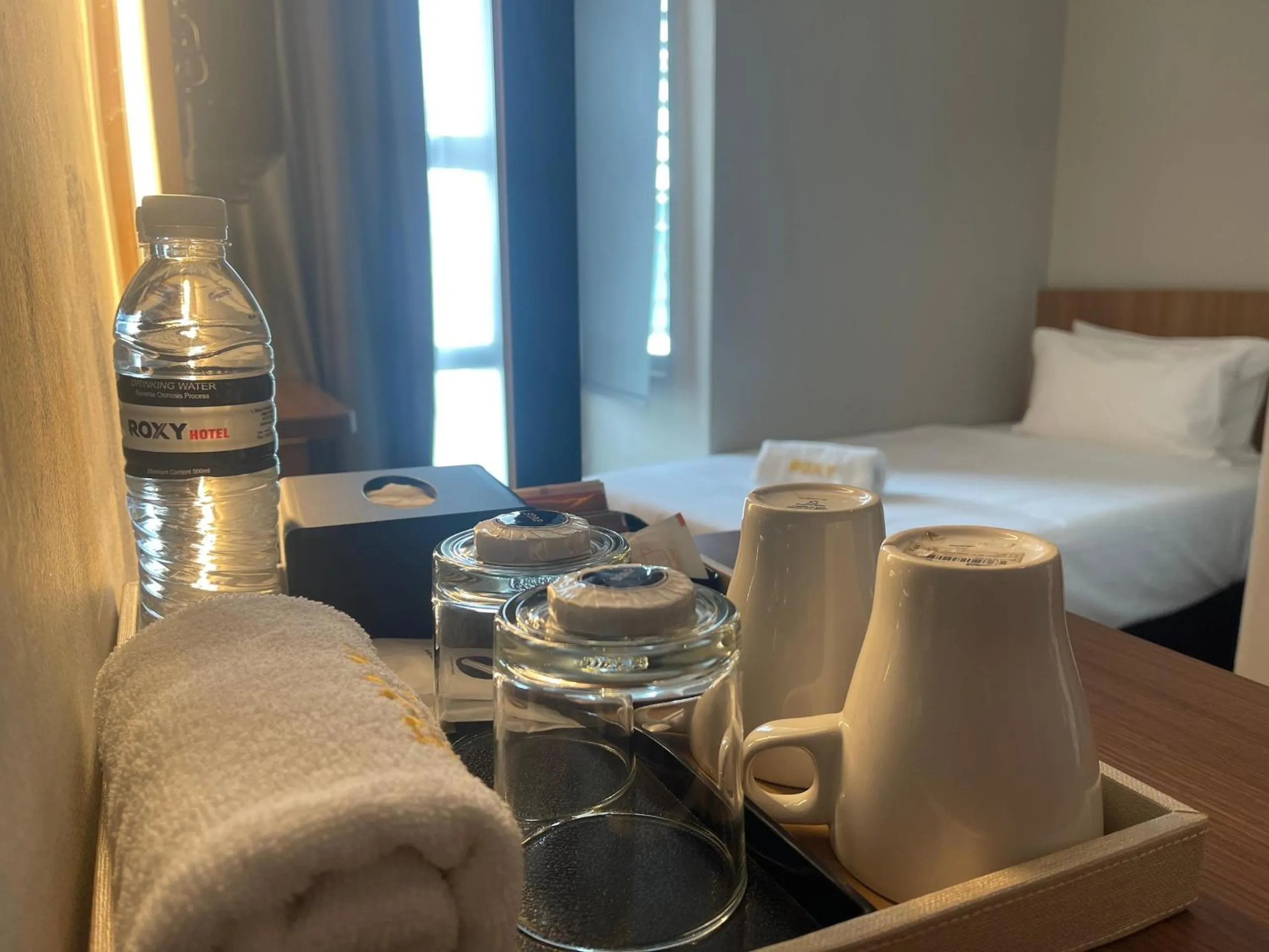 Bed in Roxy Hotel Aiman