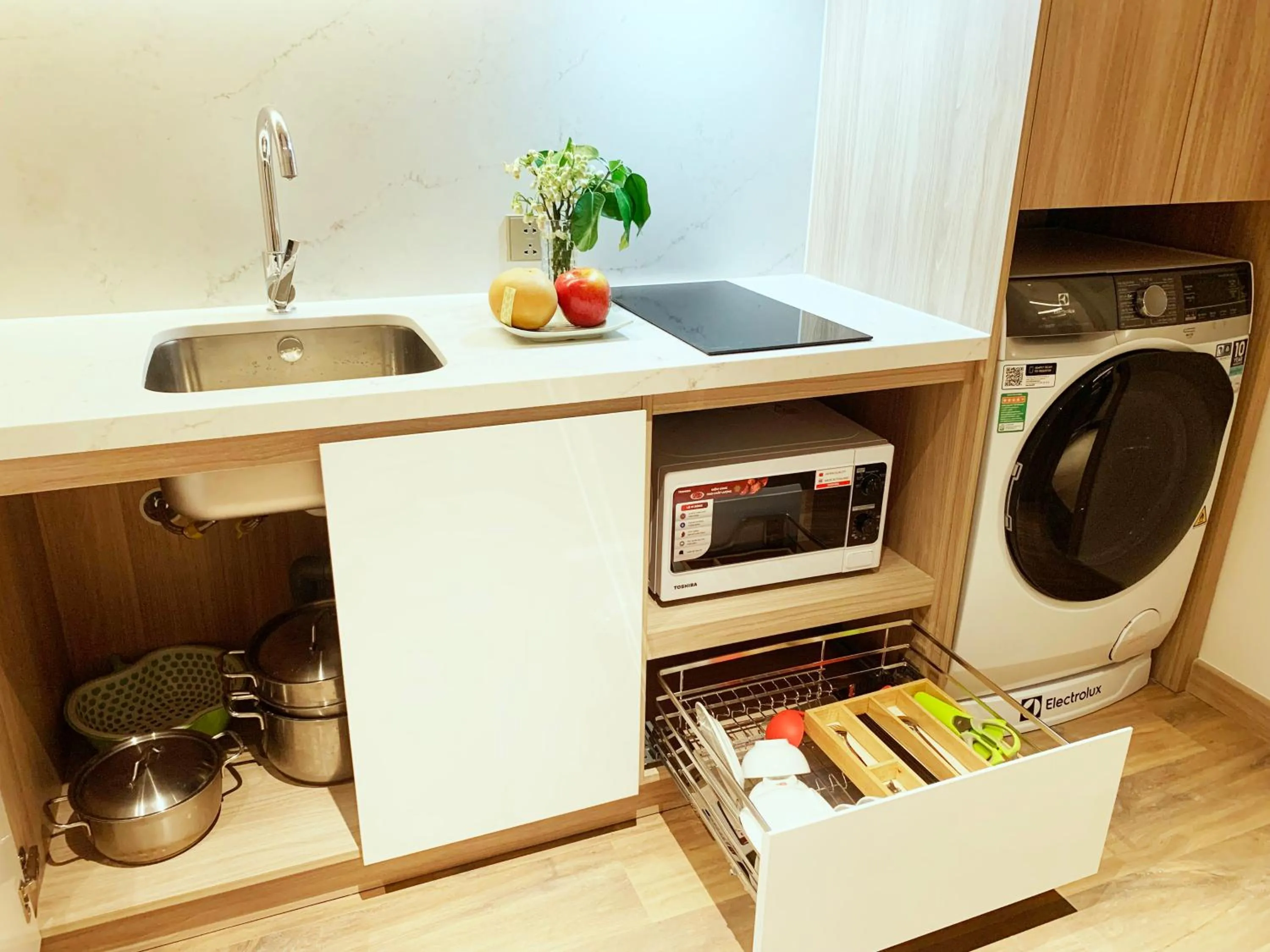 kitchen in HB Serviced Apartment - Alacarte Hạ Long