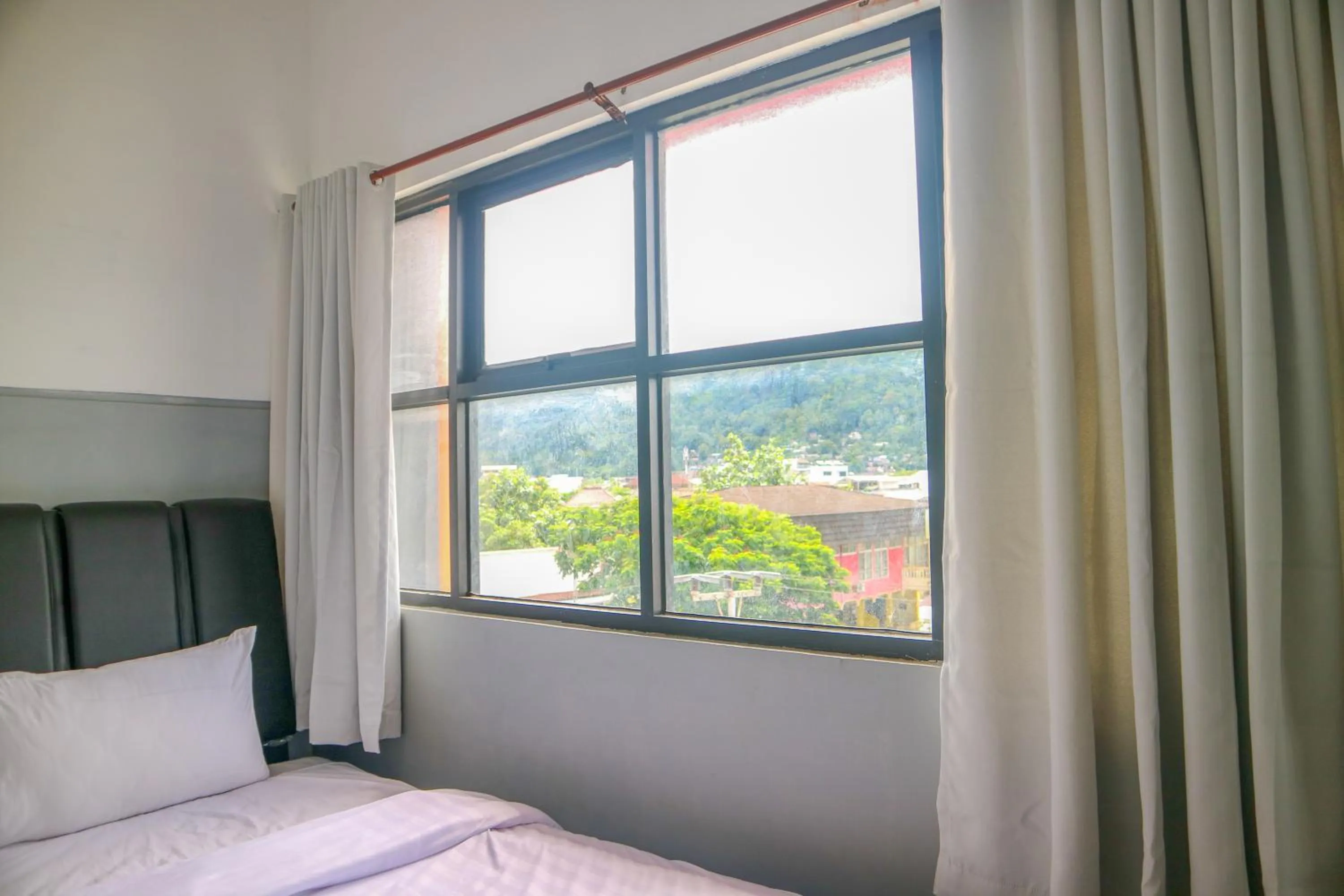 Bed in 360 Homestay Padang