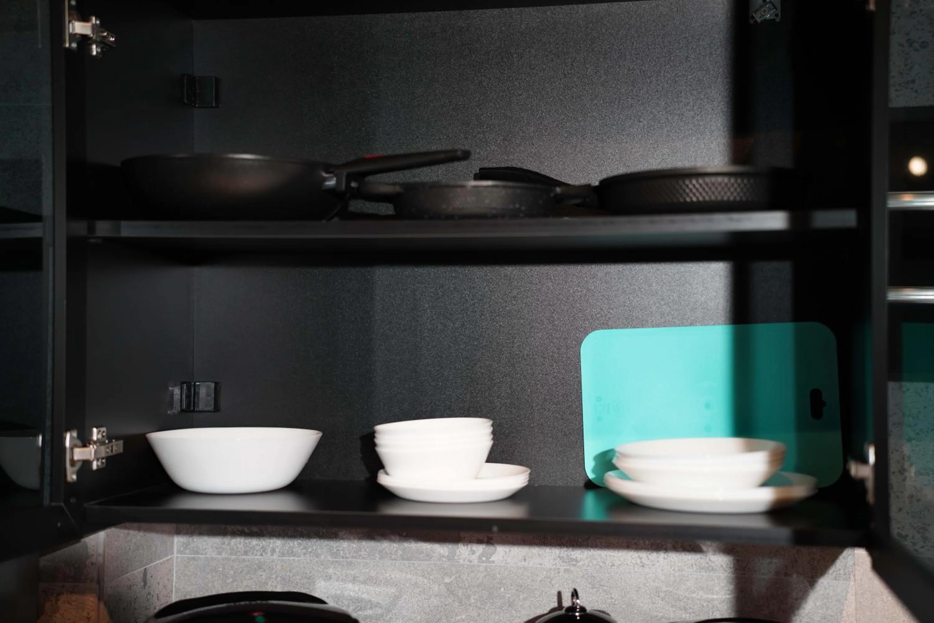 Kitchen or kitchenette in Monev Suites Hotel