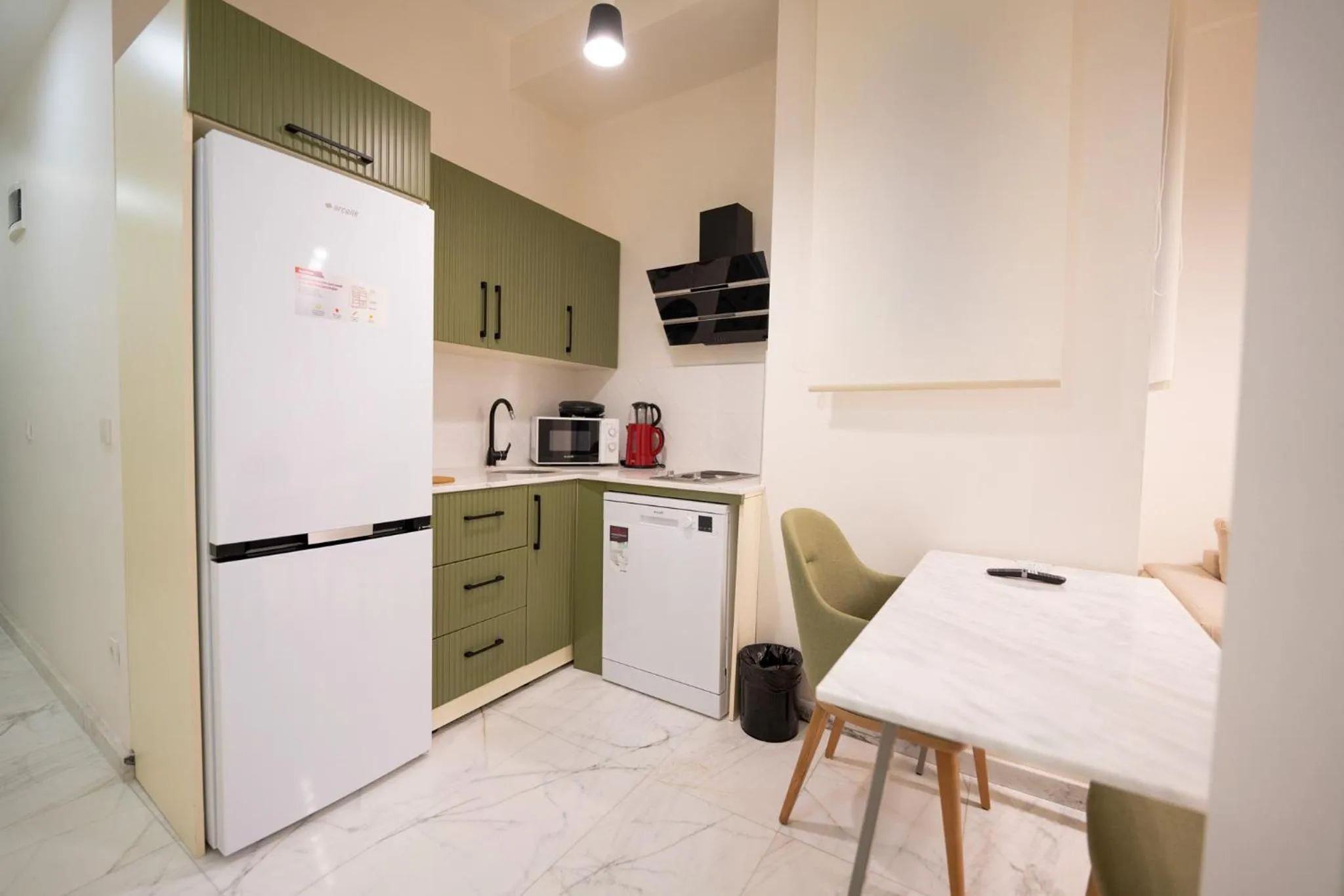 Coffee/tea facilities in Monev Suites Hotel