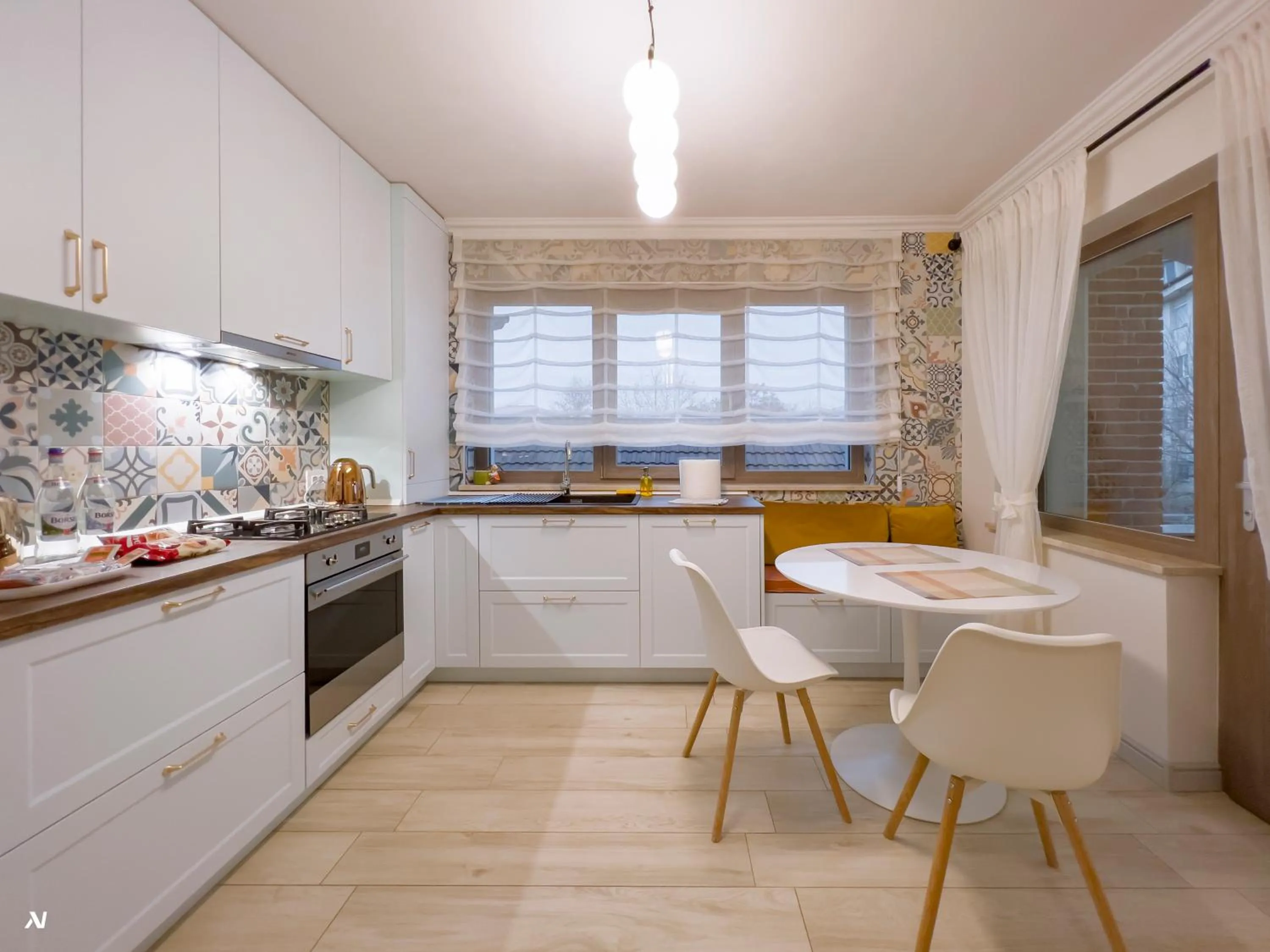 Kitchen or kitchenette in First Apartments