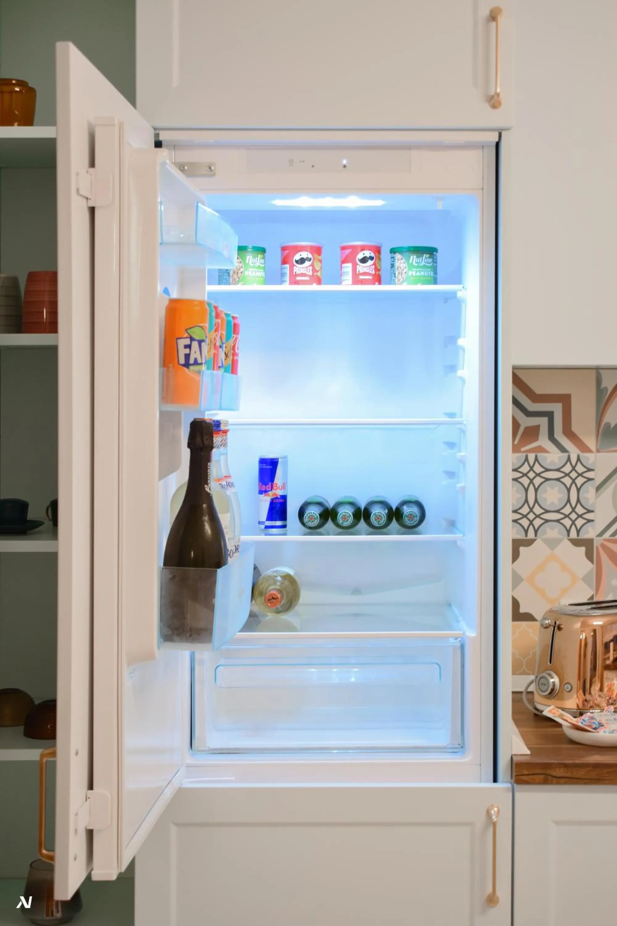 Kitchen or kitchenette in First Apartments