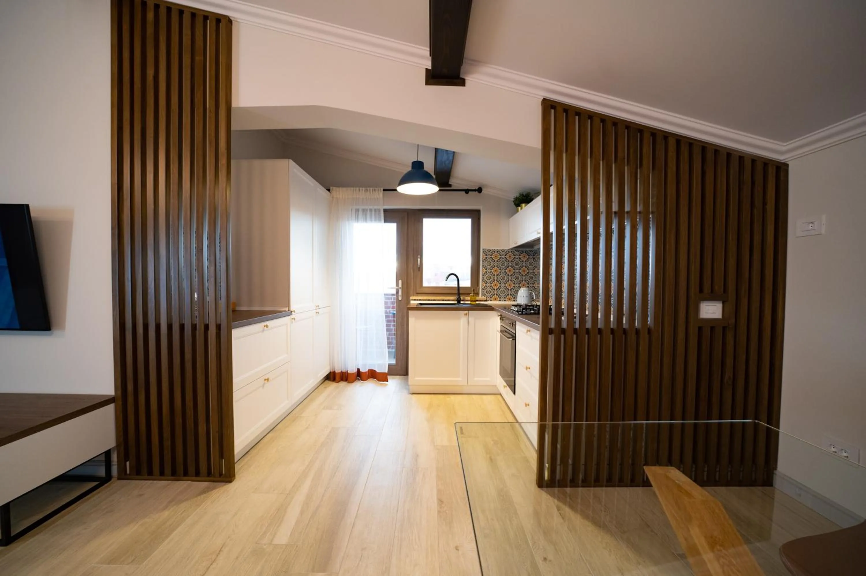 Kitchen or kitchenette in First Apartments