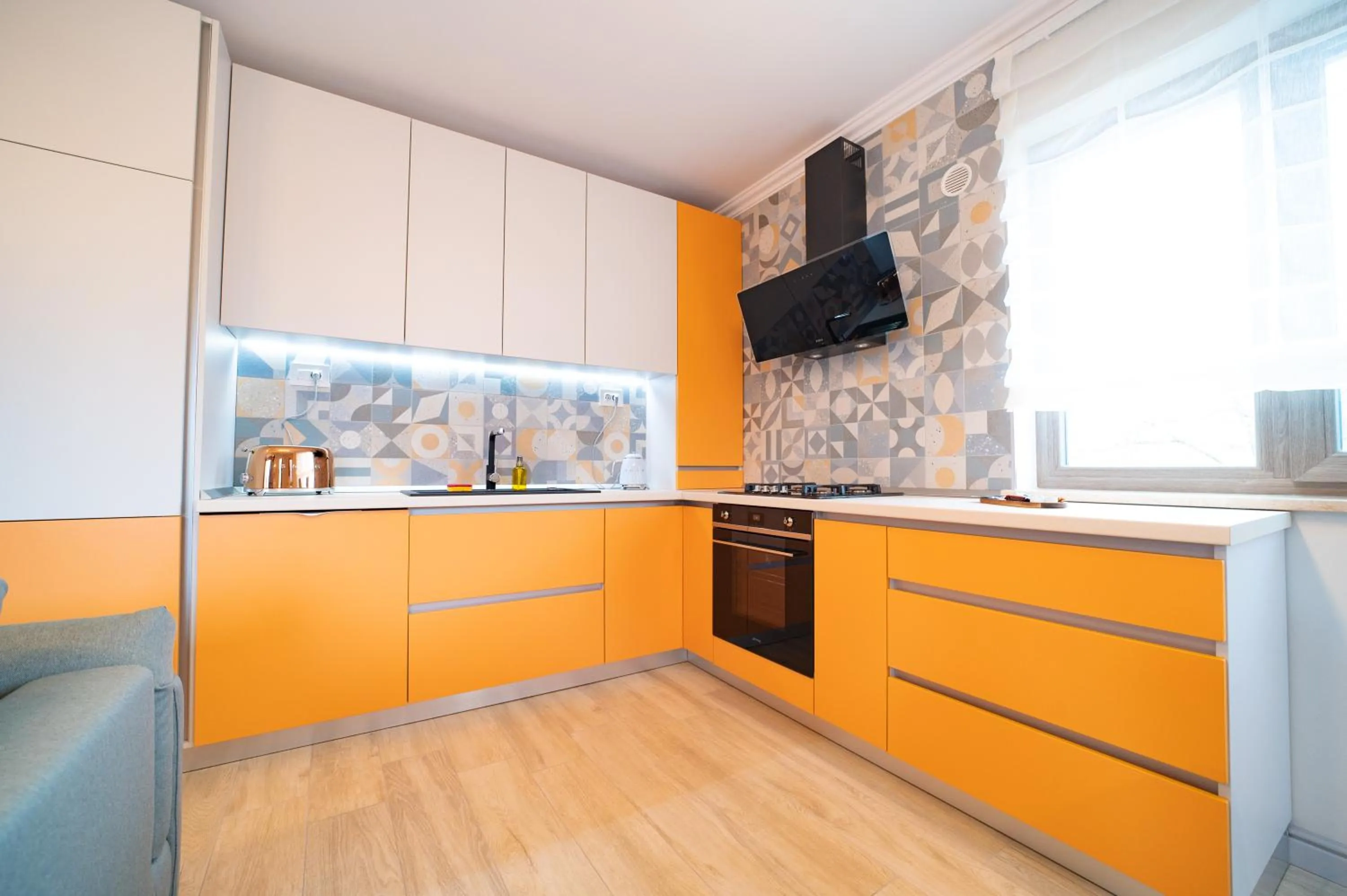 Kitchen or kitchenette in First Apartments