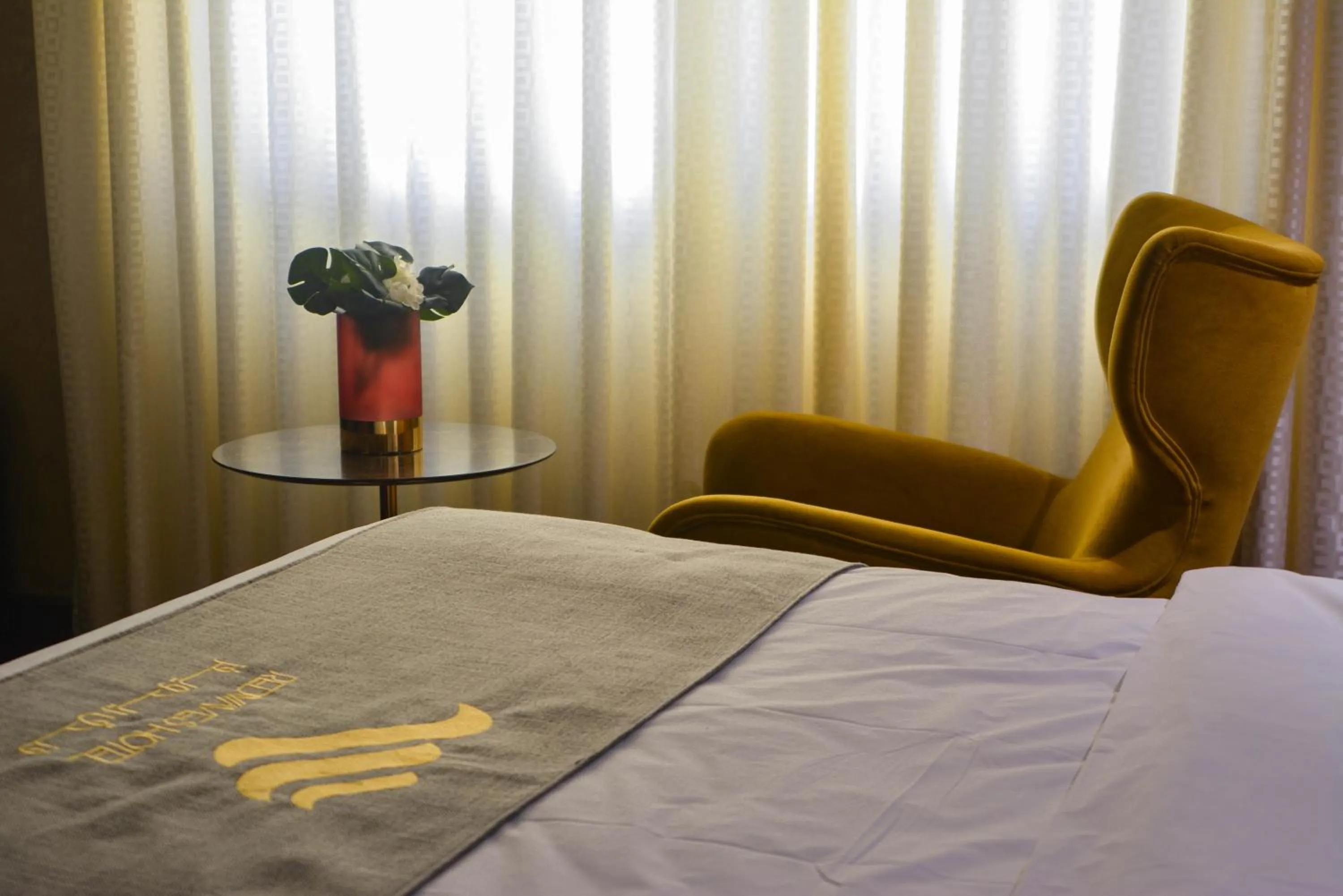 Bed in Redwaves Hotel