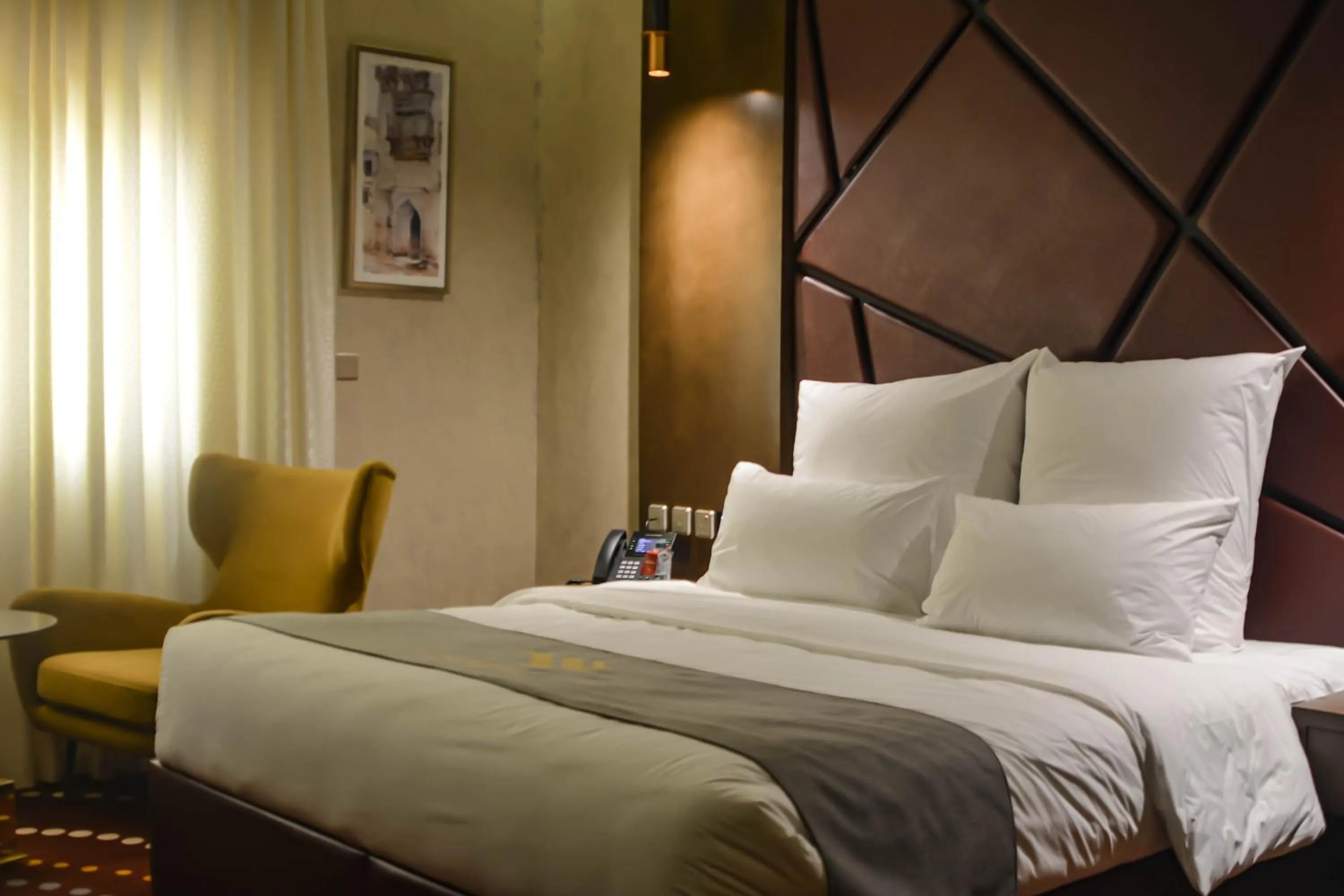 Bed in Redwaves Hotel