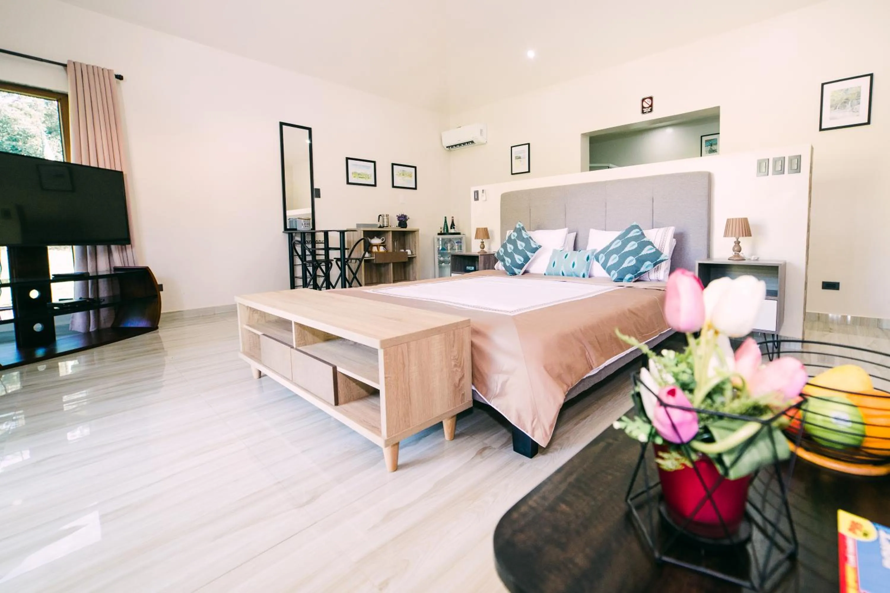 Bed in Denika's Suites