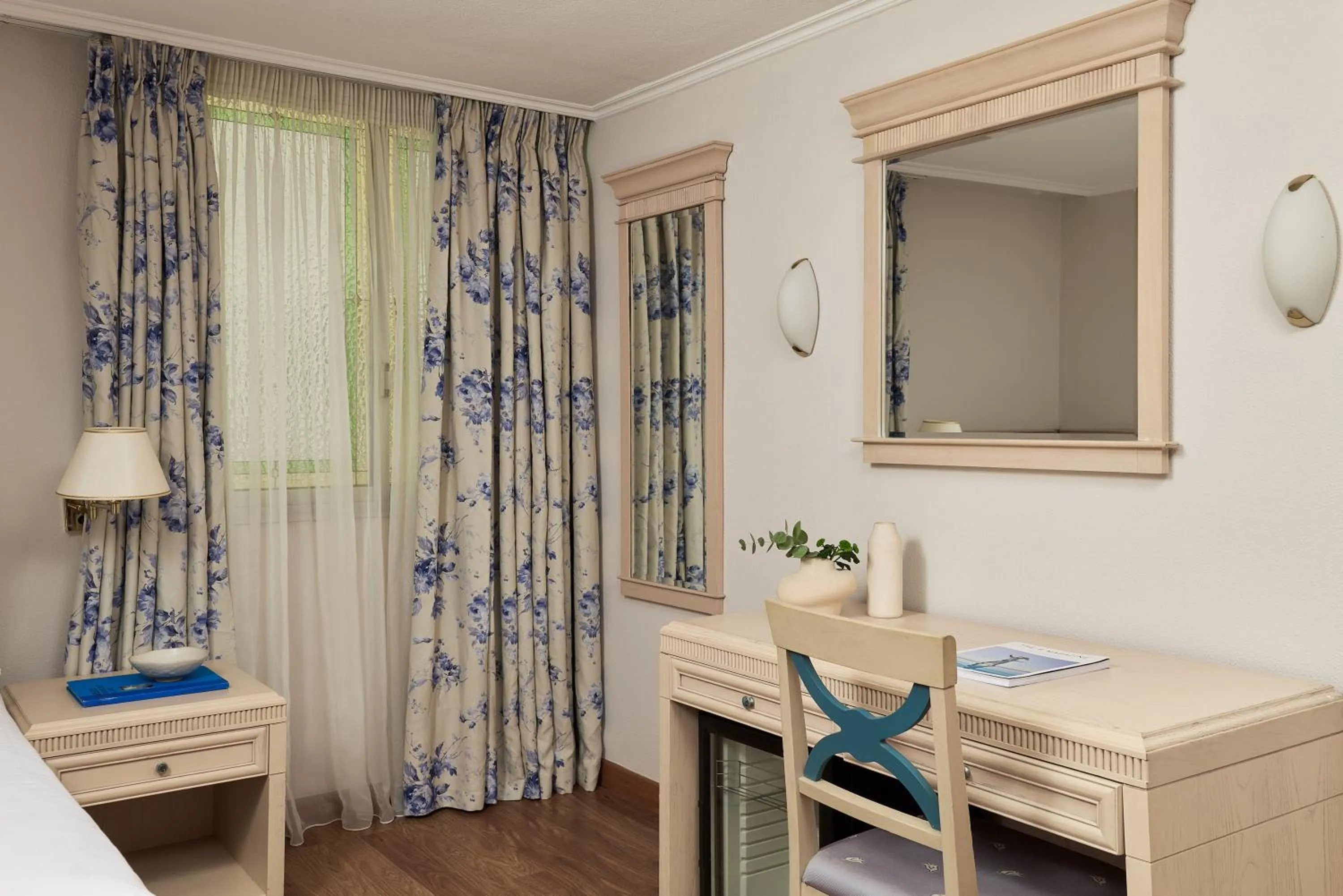 Bedroom in Titania Hotel