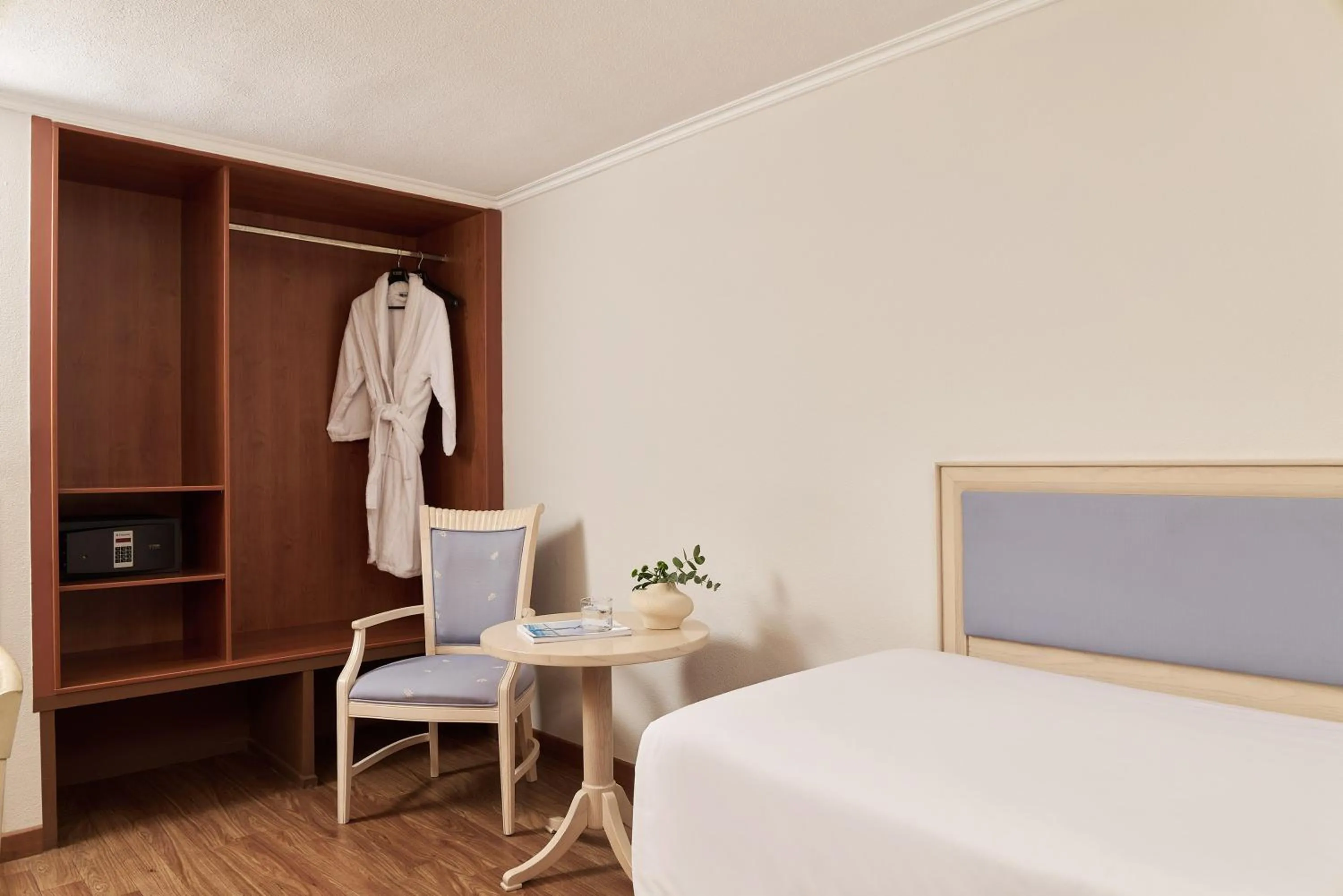 Bed in Titania Hotel