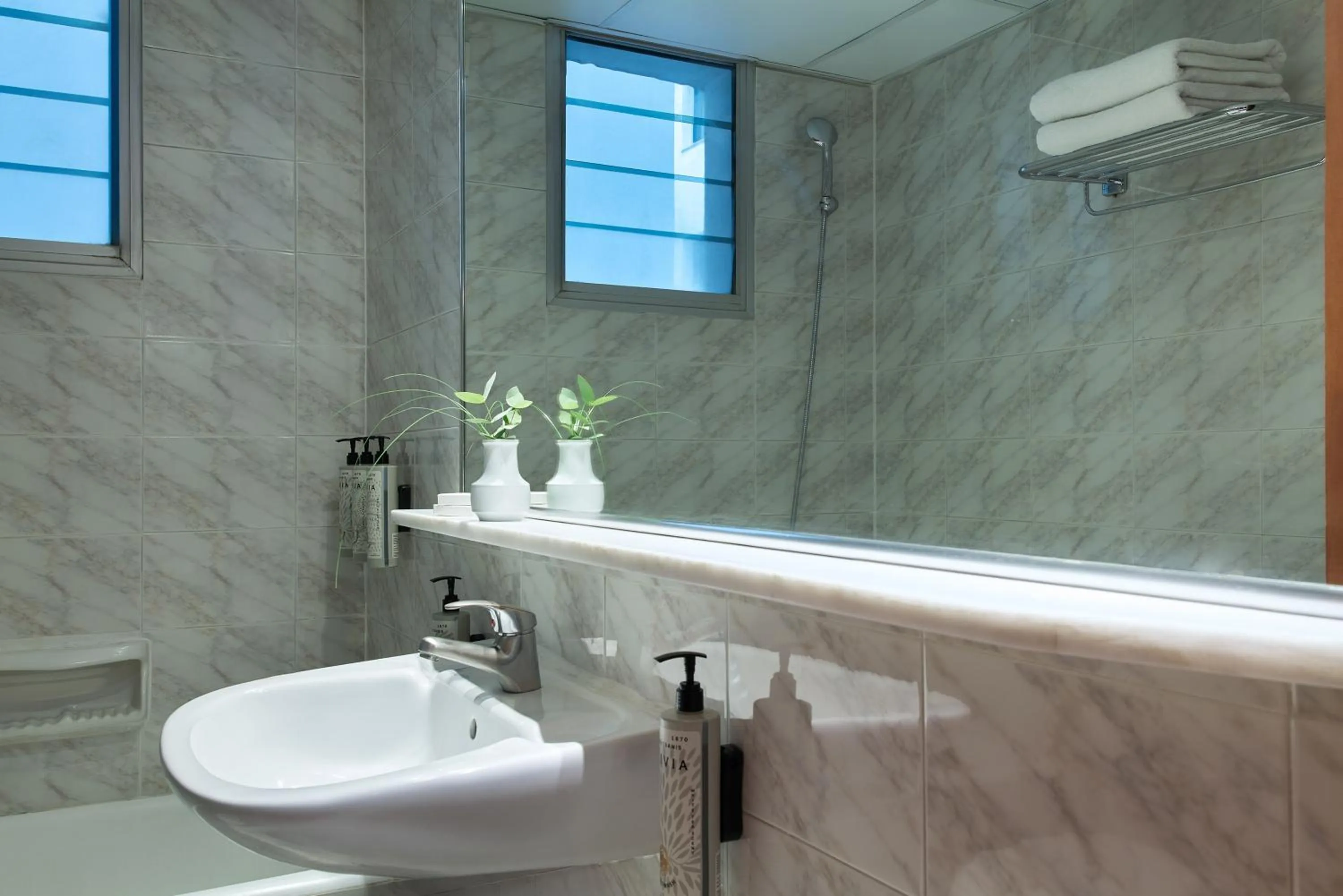 Bathroom in Titania Hotel