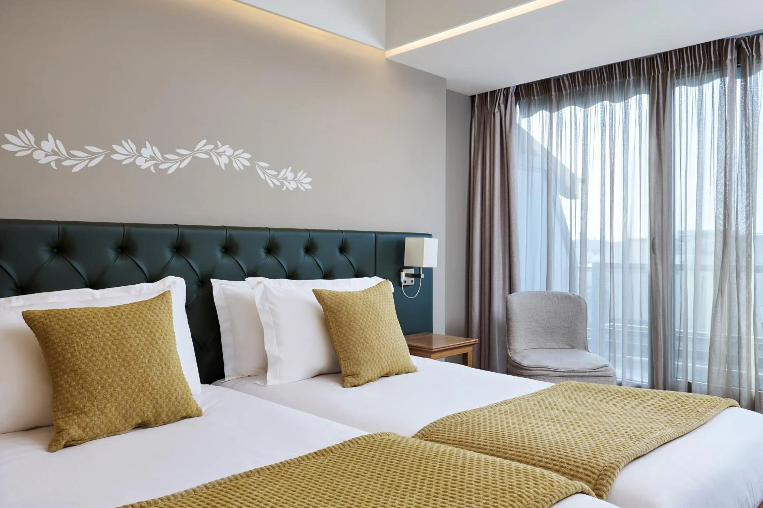 Bed in Titania Hotel