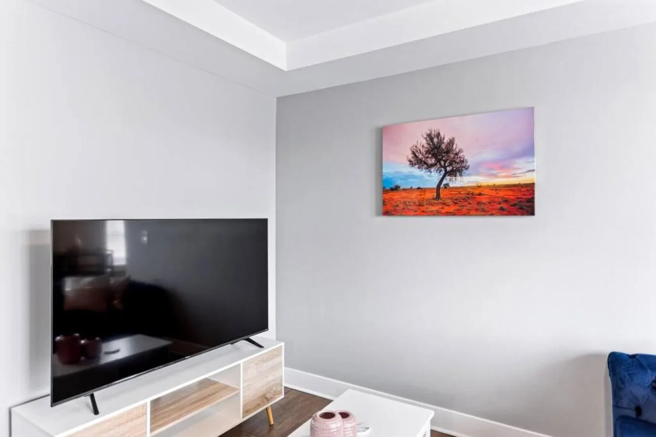 Communal lounge/ TV room in Your Cozy One Bedroom Midtown