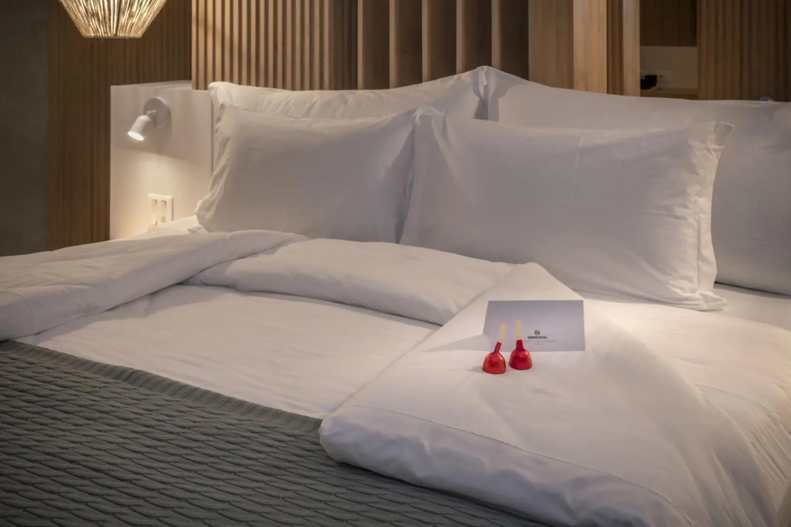 Bed in SERHS Experience Suítes