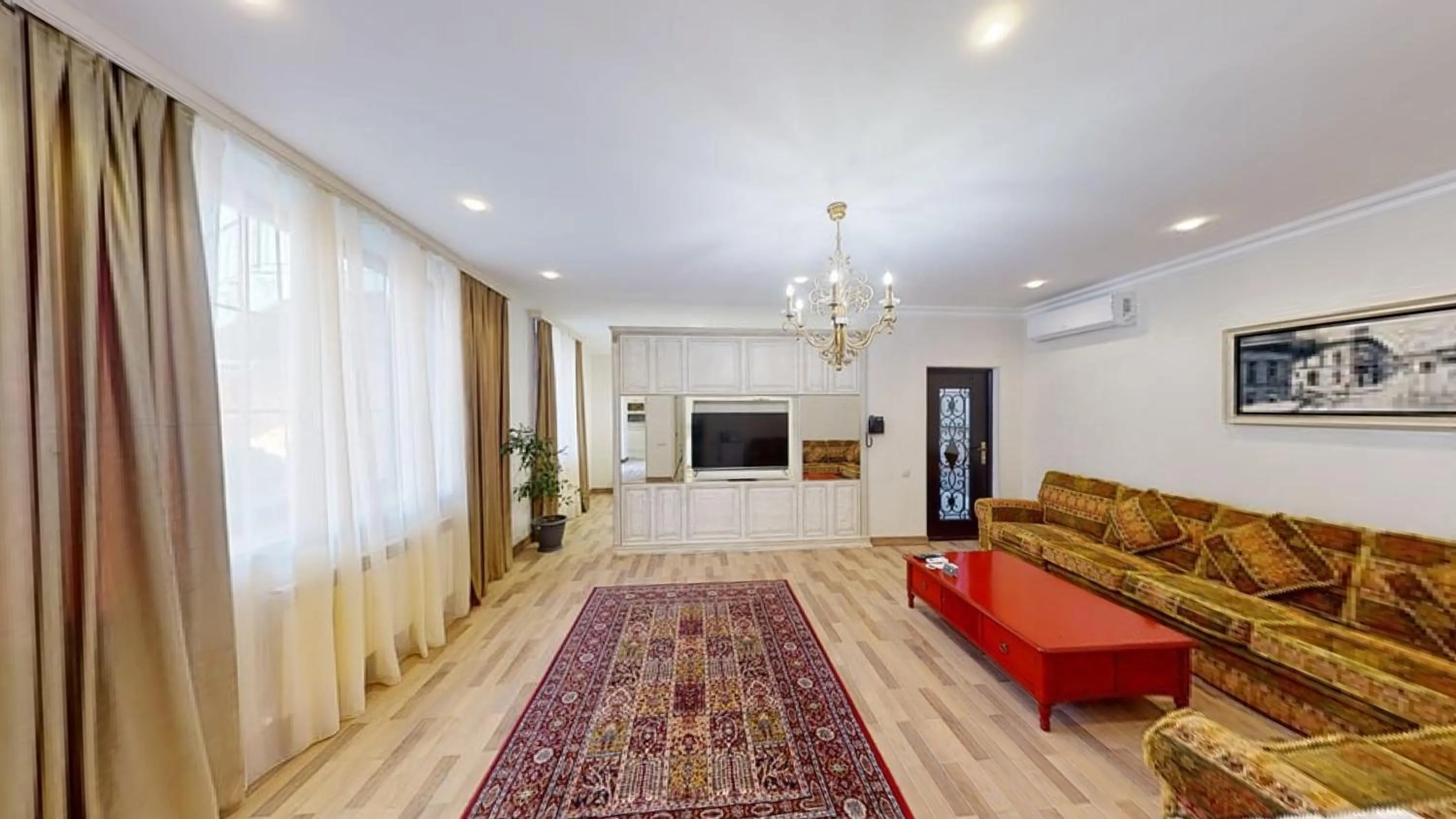 Communal lounge/ TV room in Aspar Boutique Hotel