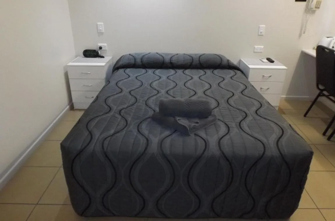 Bed in Three Moon Motel