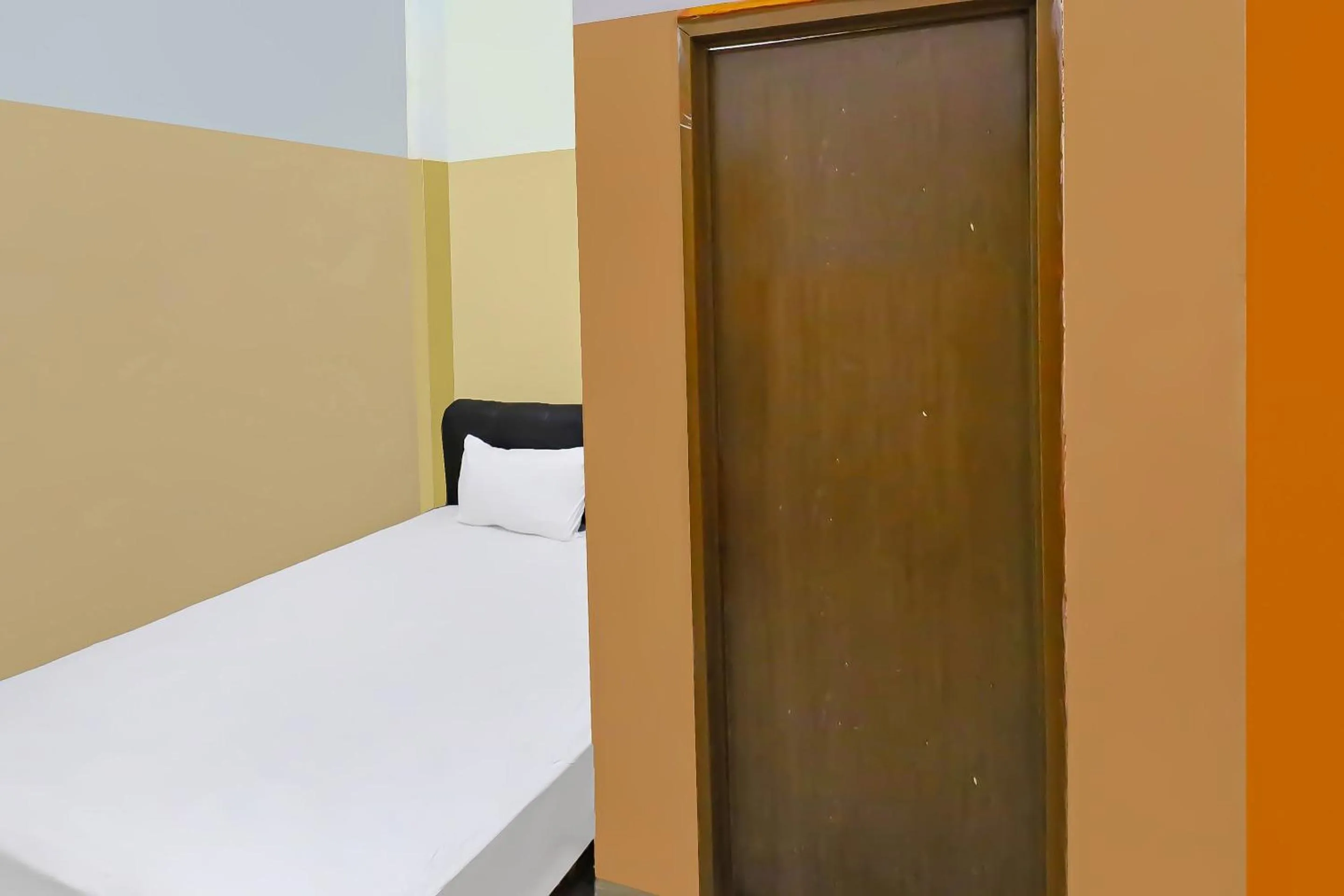 Bedroom in Hotel O Pondokan Tali Super