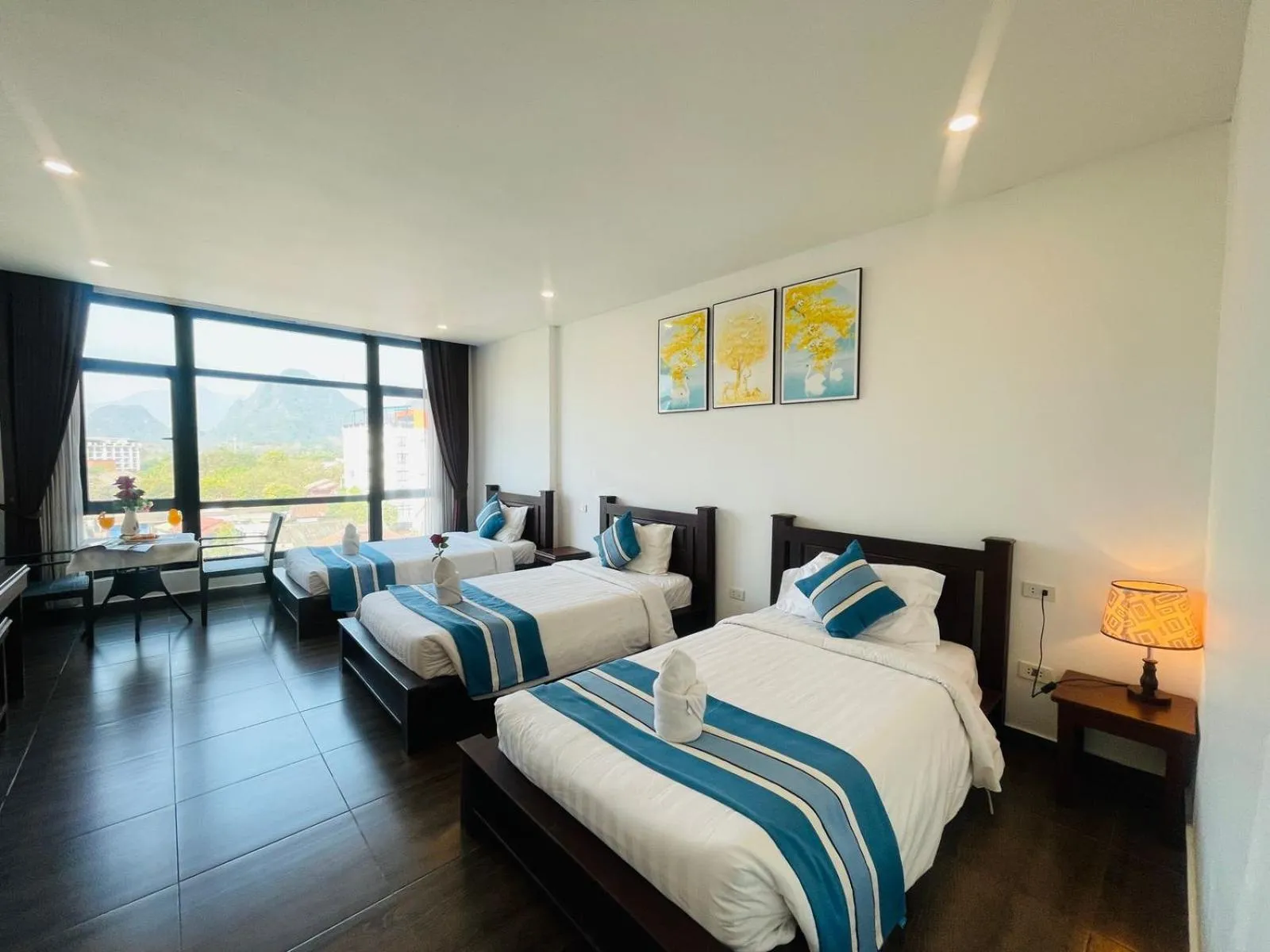 Bed in VANG VIENG TOPVIEW HOTEL