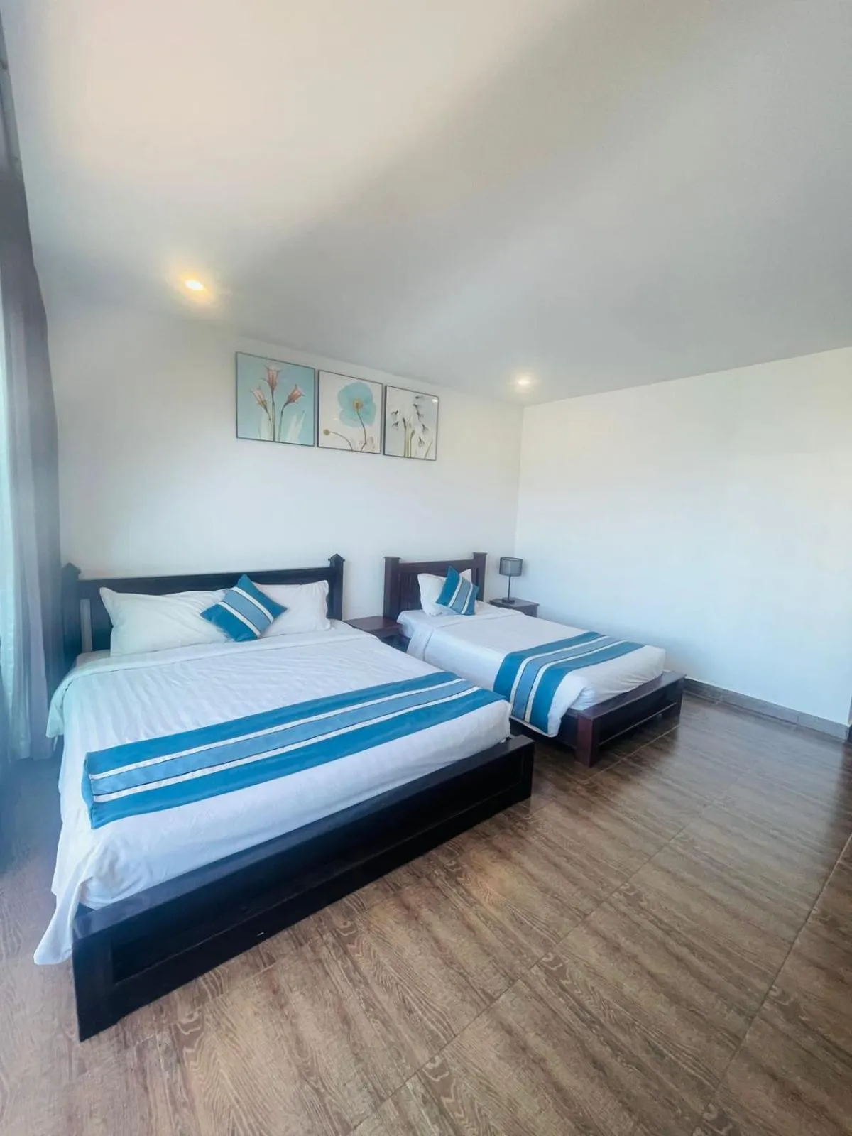 Bed in VANG VIENG TOPVIEW HOTEL