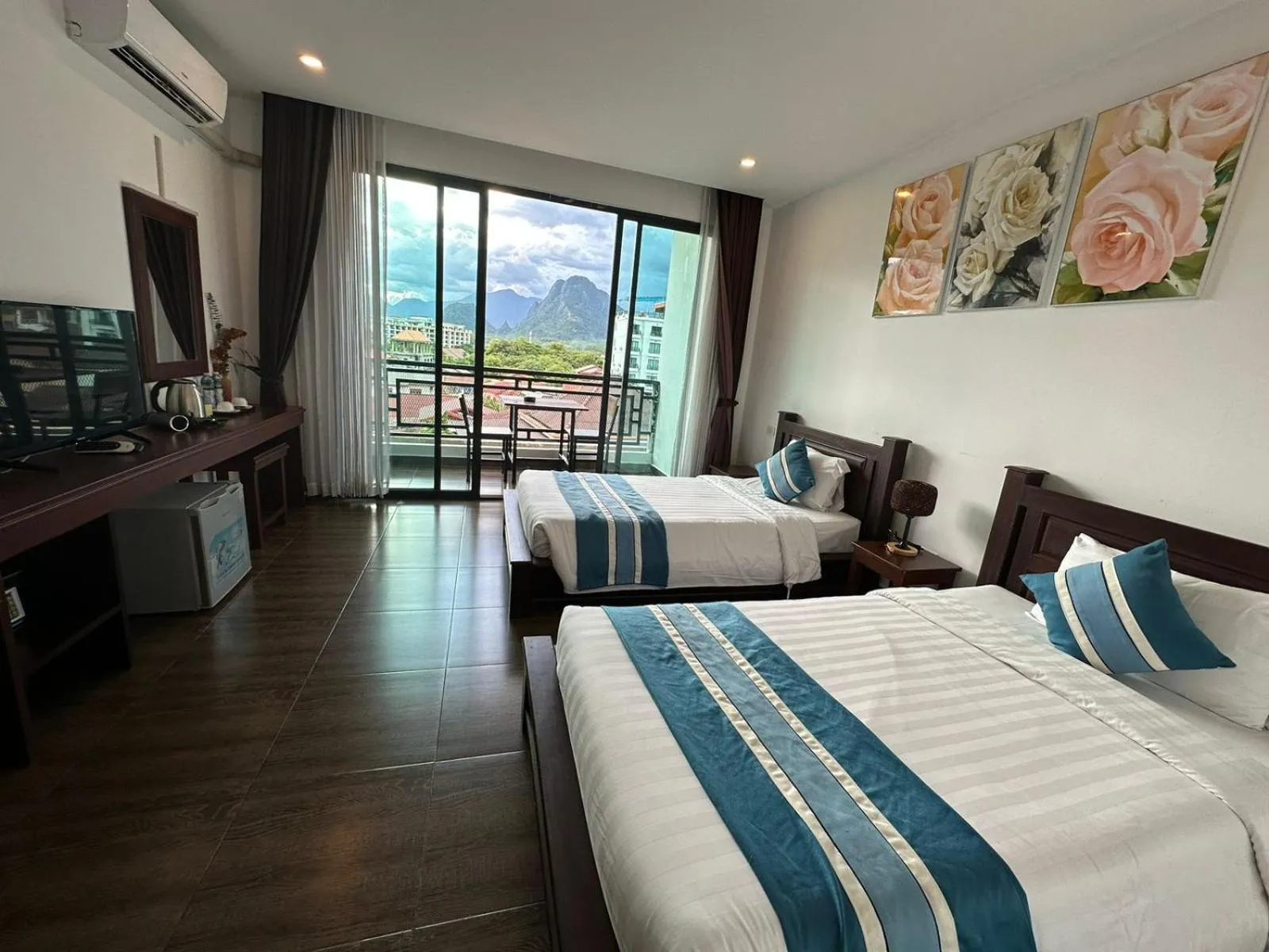 Bed in VANG VIENG TOPVIEW HOTEL