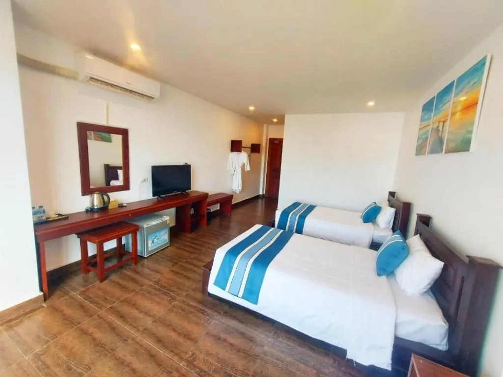 Bed in VANG VIENG TOPVIEW HOTEL