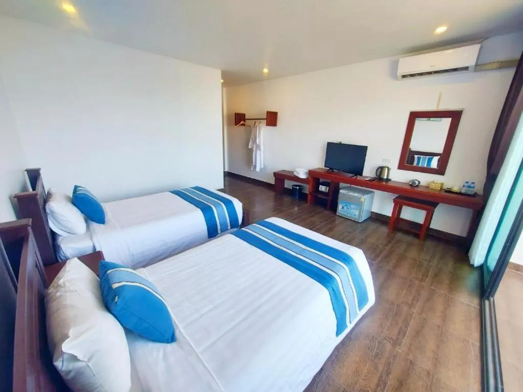 Bed in VANG VIENG TOPVIEW HOTEL