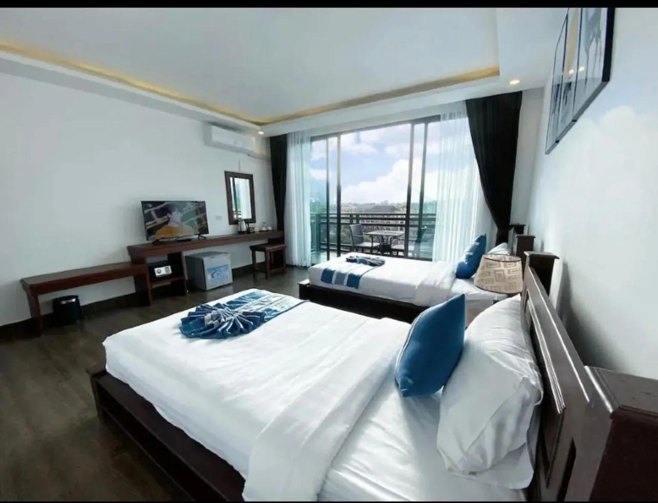 Bed in VANG VIENG TOPVIEW HOTEL