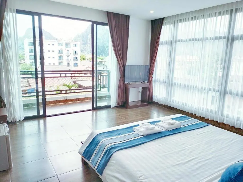 Bed in VANG VIENG TOPVIEW HOTEL