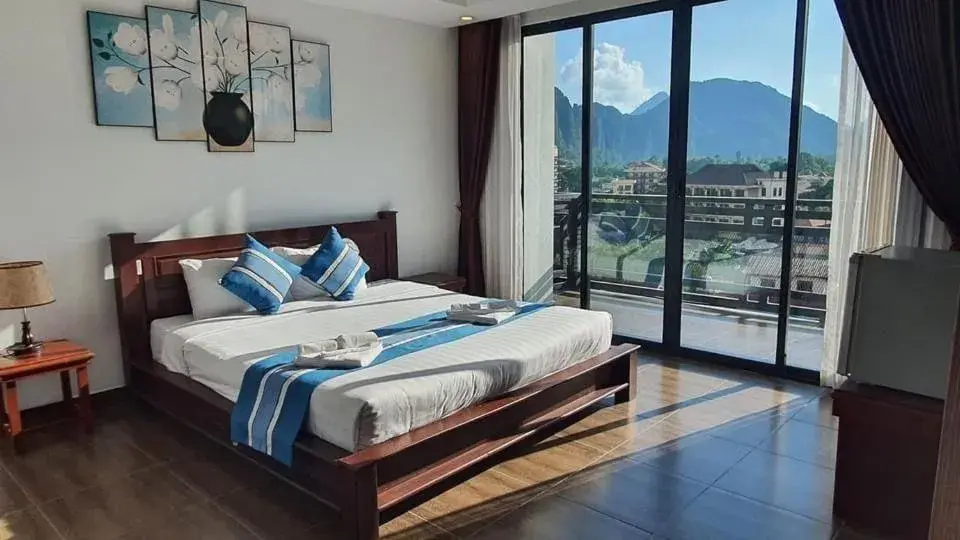 Deluxe Double Room with Balcony in VANG VIENG TOPVIEW HOTEL Deluxe Double Room with Balcony in VANG VIENG TOPVIEW HOTEL