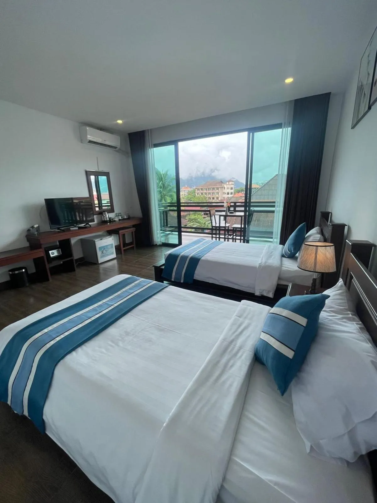 Bed in VANG VIENG TOPVIEW HOTEL