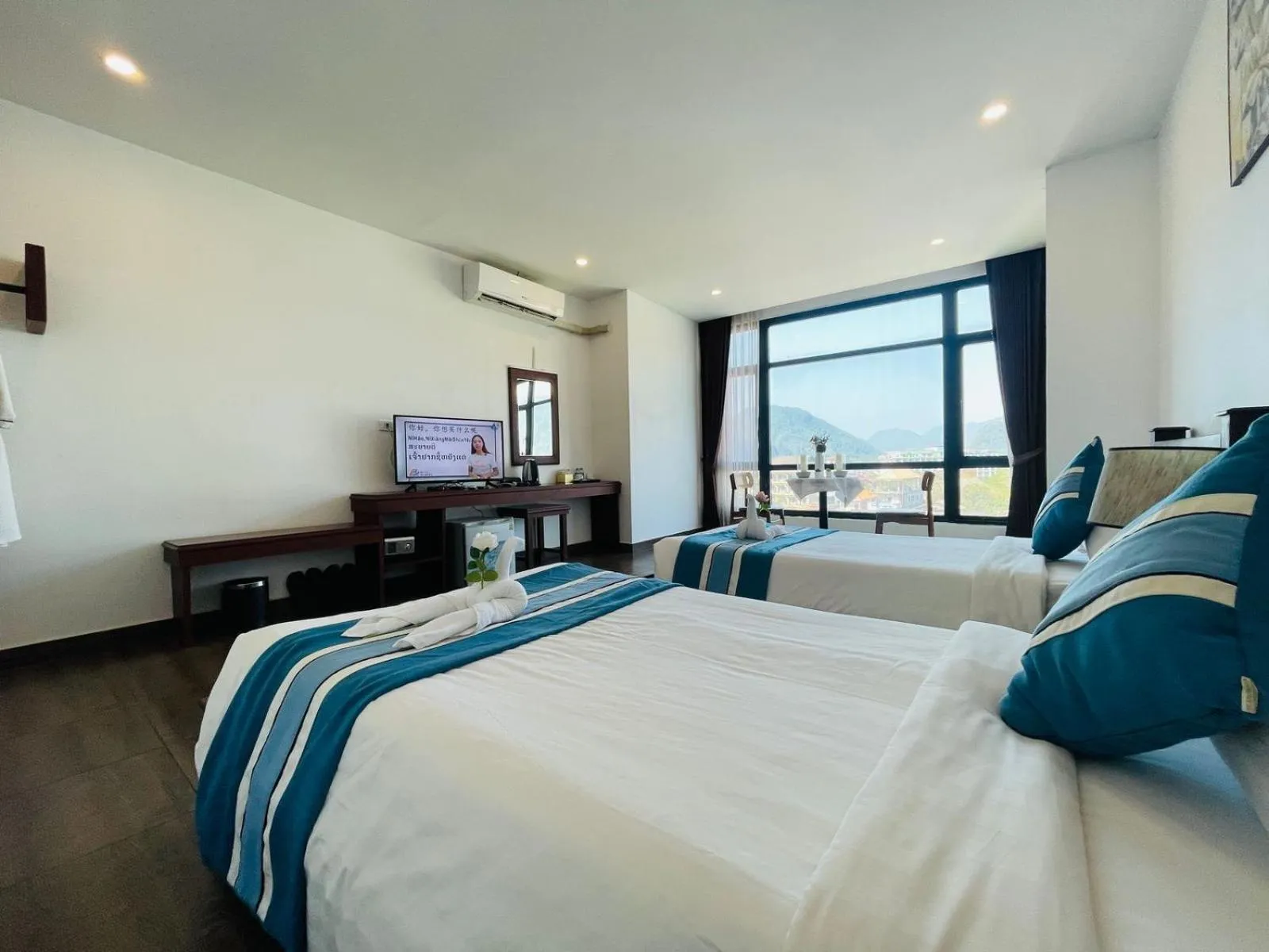 Bed in VANG VIENG TOPVIEW HOTEL