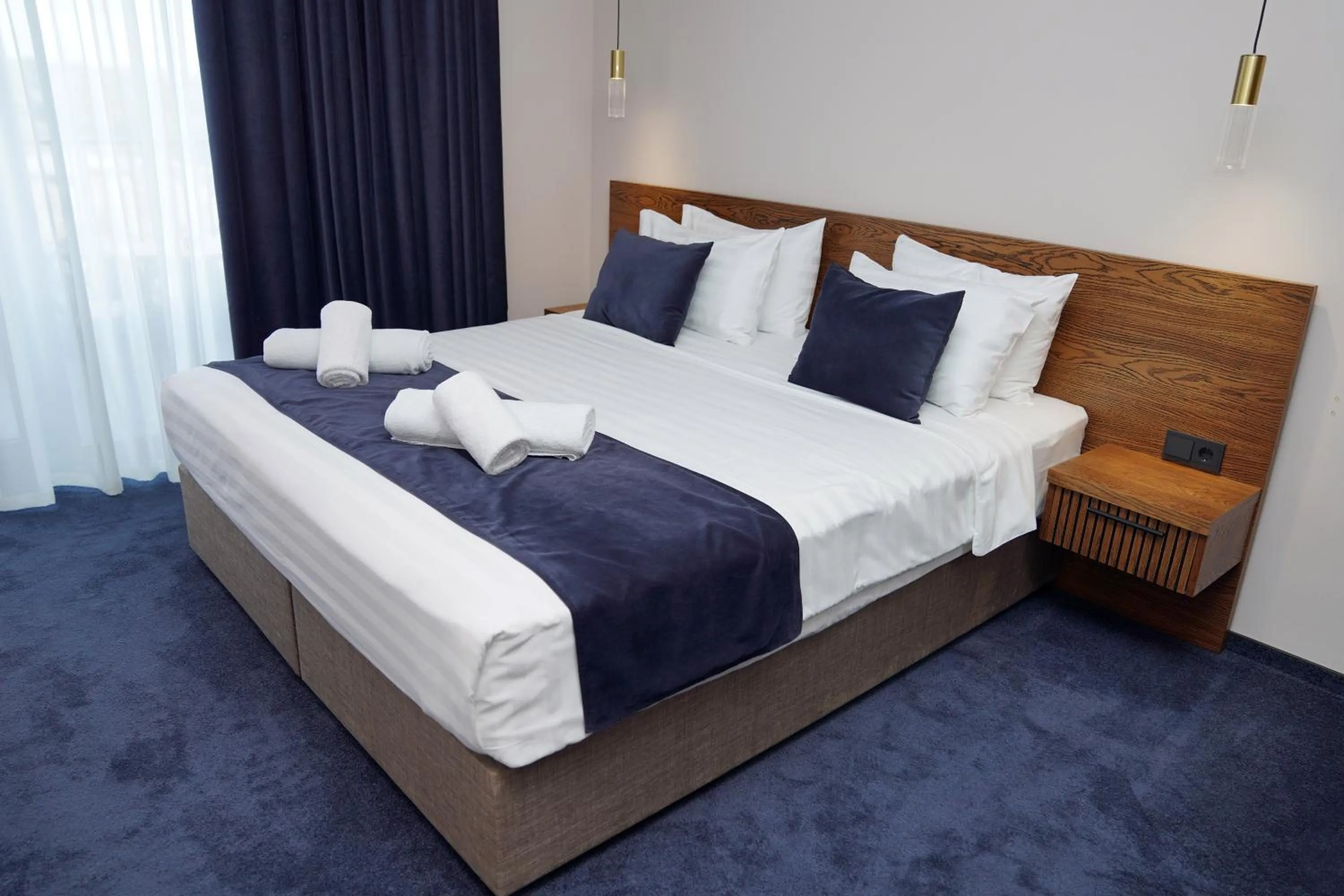 Bed in Hotel Tiflisi Inn