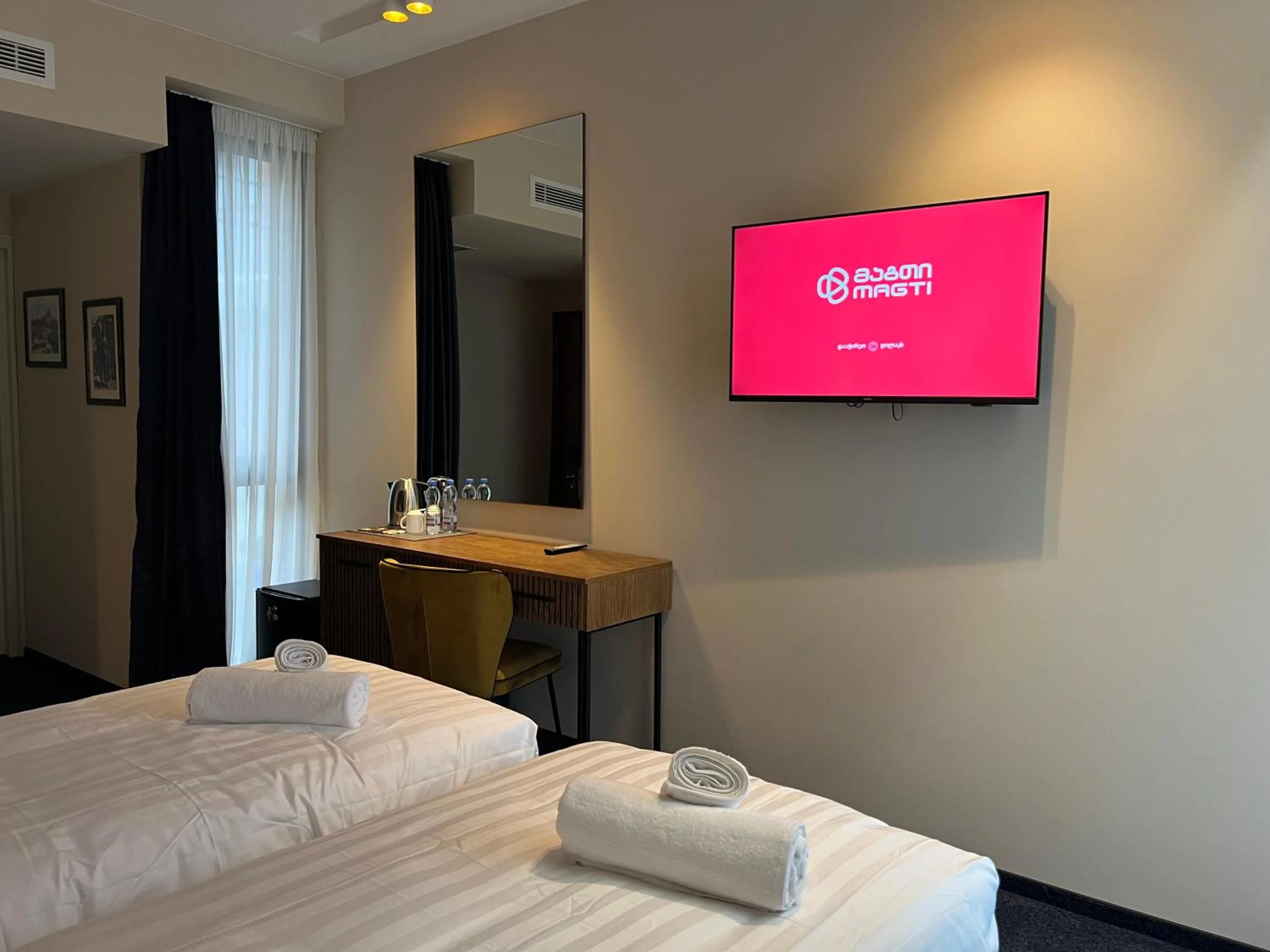 Bed in Hotel Tiflisi Inn