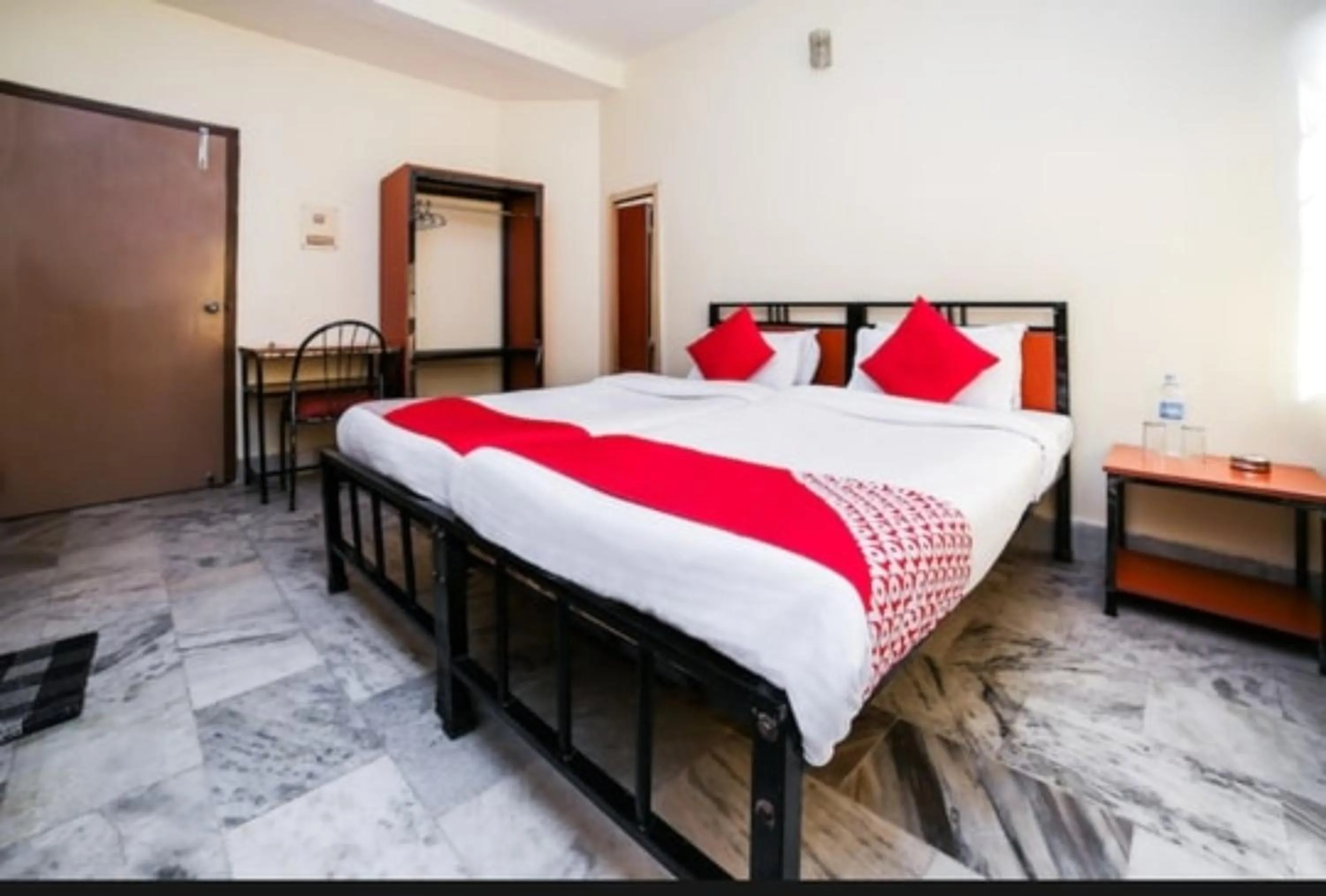 Bedroom in Uttam Guest House