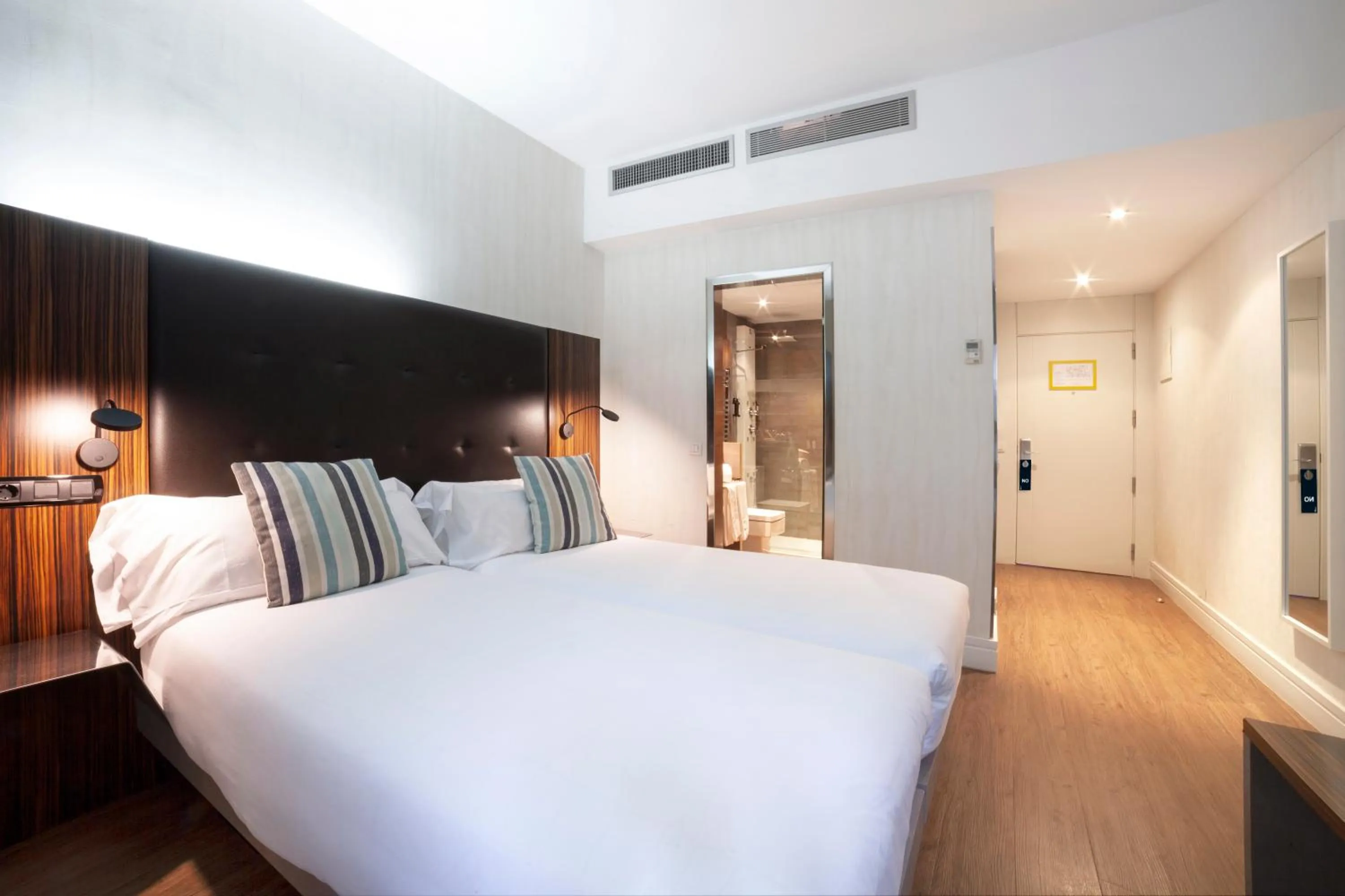 Bed in Petit Palace Tamarises