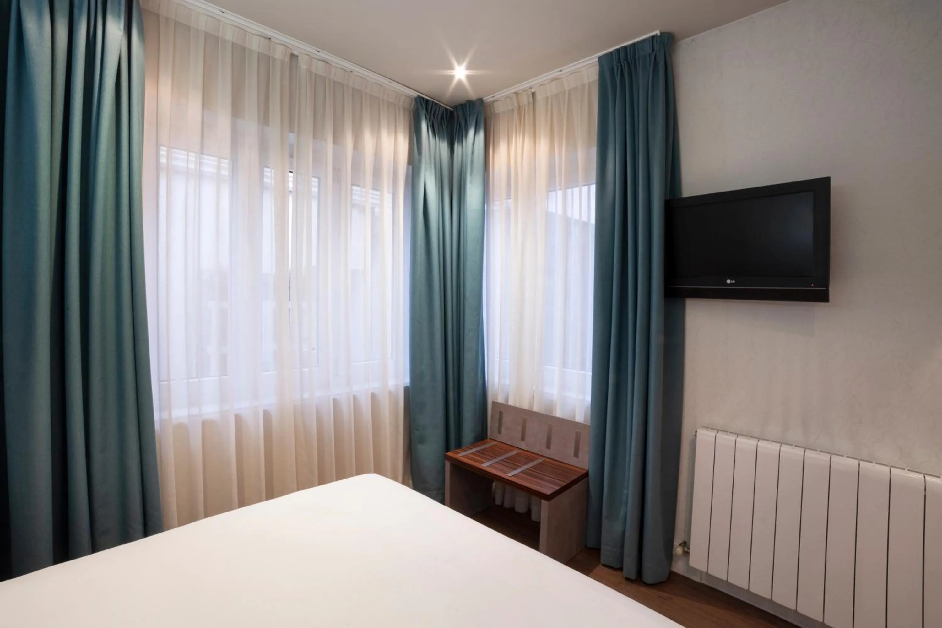 Bed in Petit Palace Tamarises