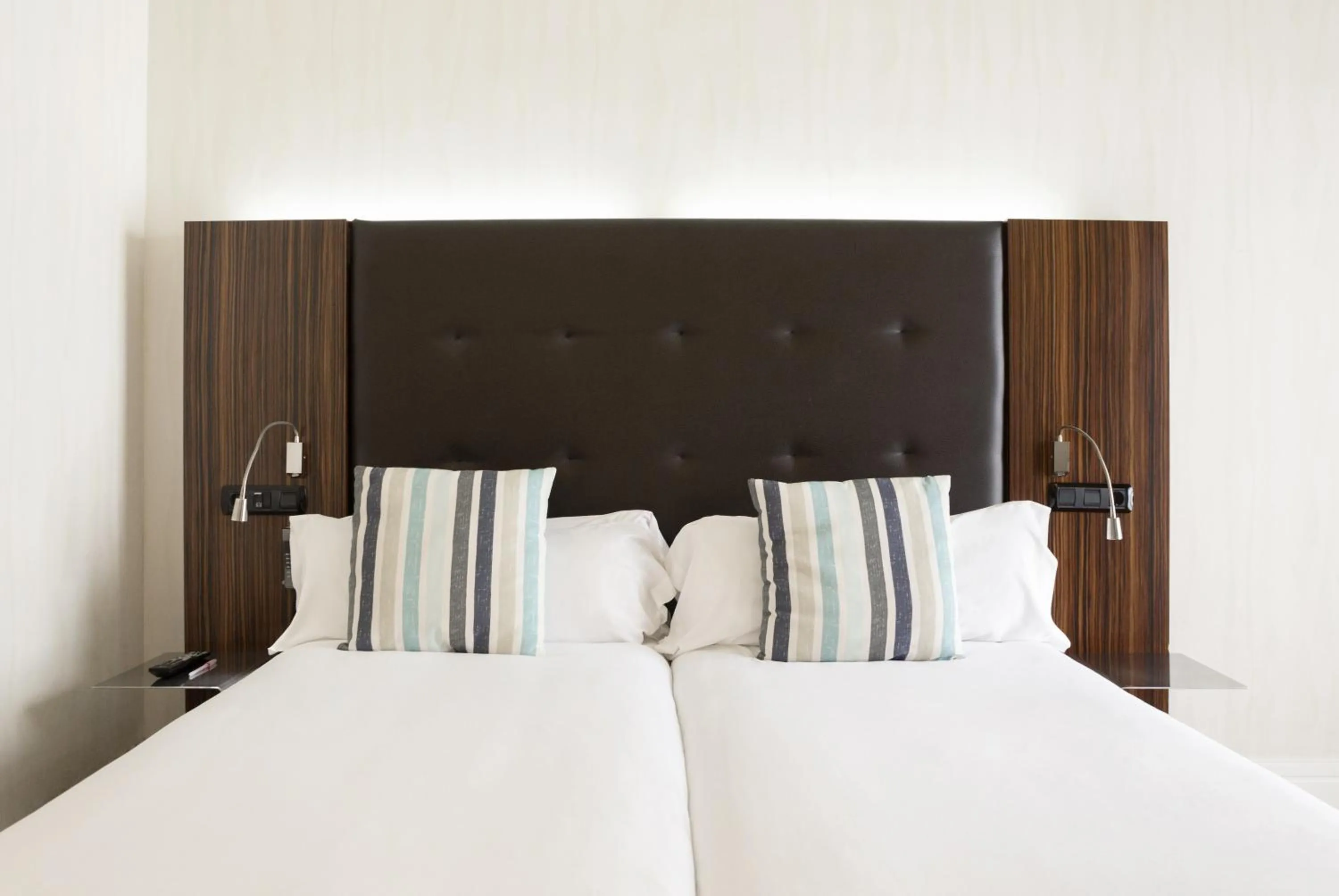 Bed in Petit Palace Tamarises