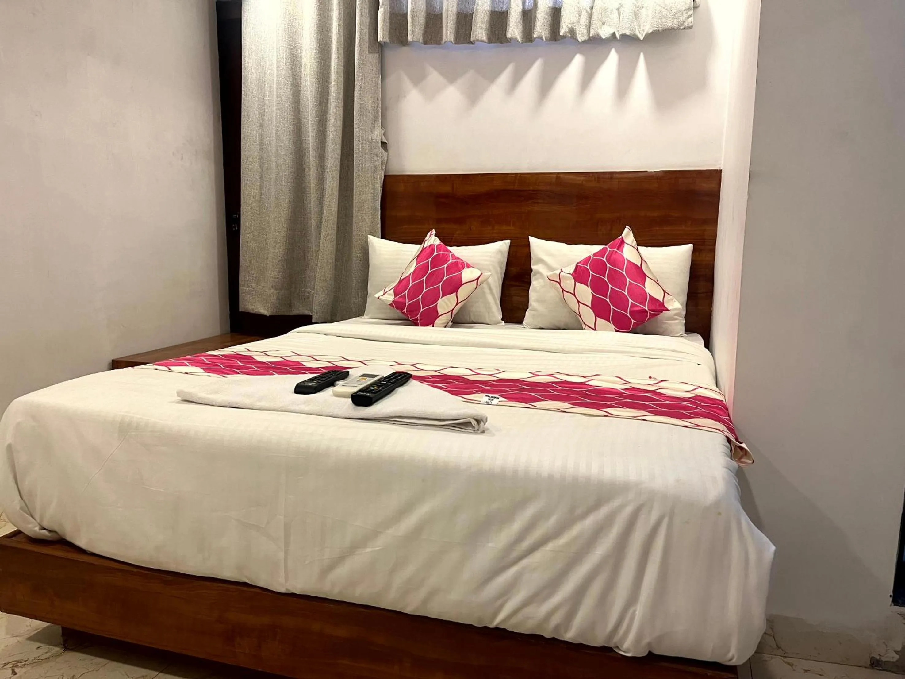 Photo of the whole room, Bed in Hotel Delmond Prime- Near NESCO