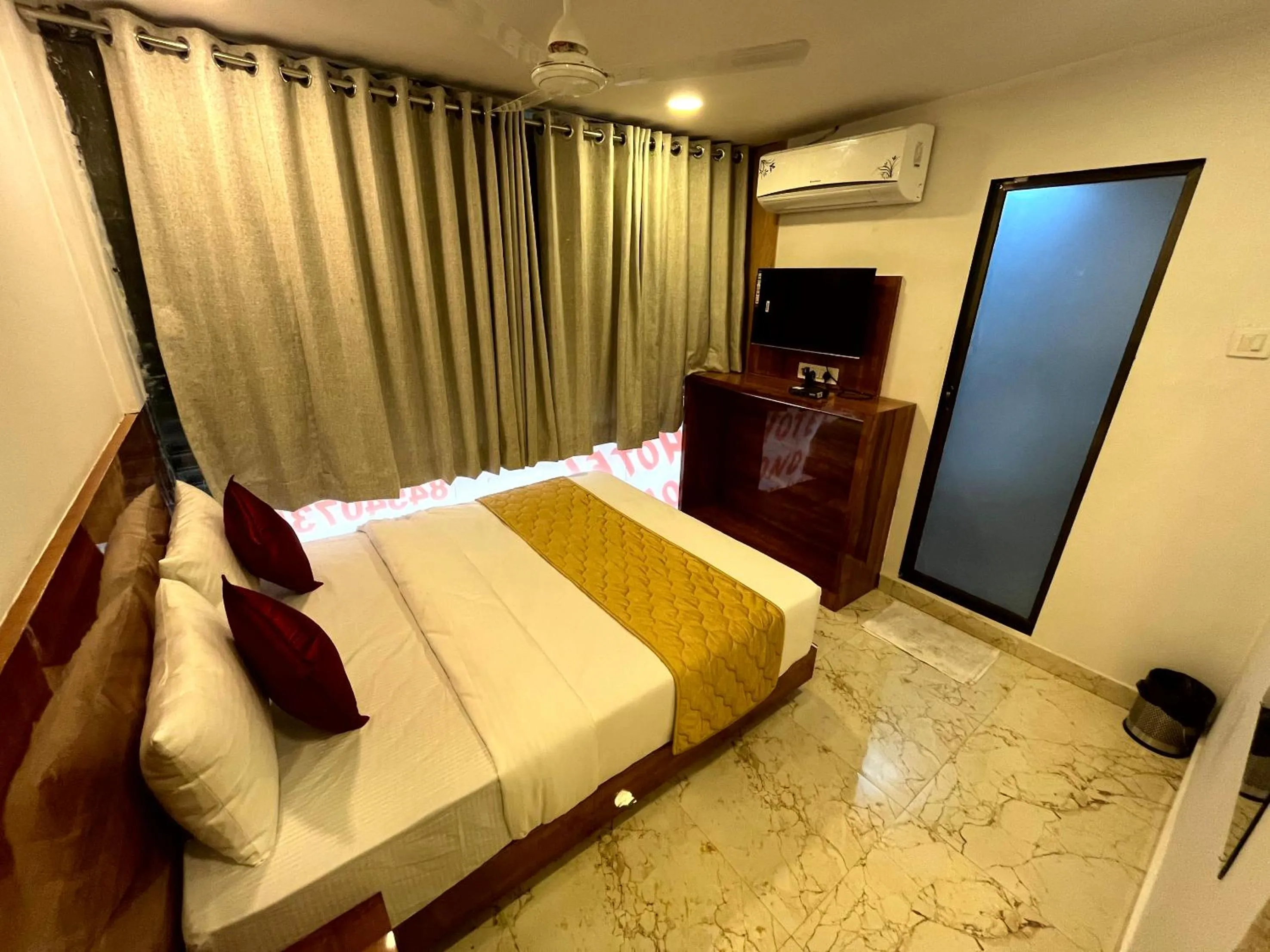 Photo of the whole room, Bed in Hotel Delmond Prime- Near NESCO