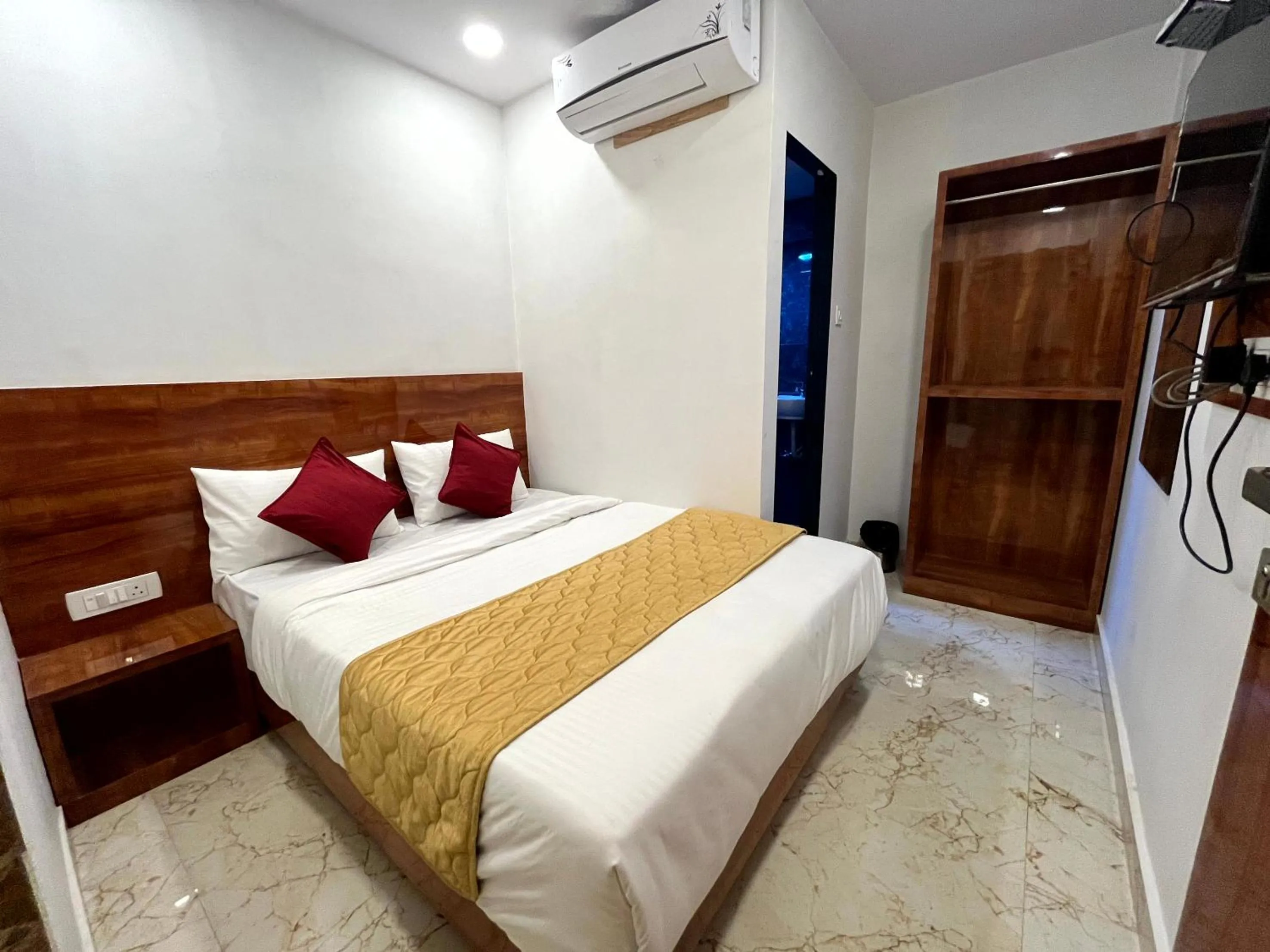 Photo of the whole room, Bed in Hotel Delmond Prime- Near NESCO