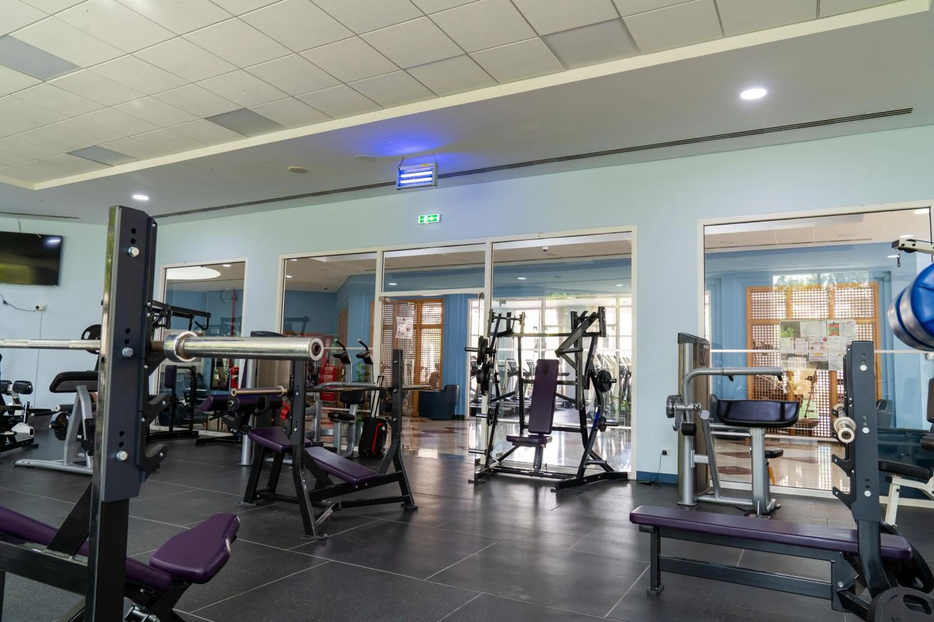 Fitness centre/facilities in eStay Hotel