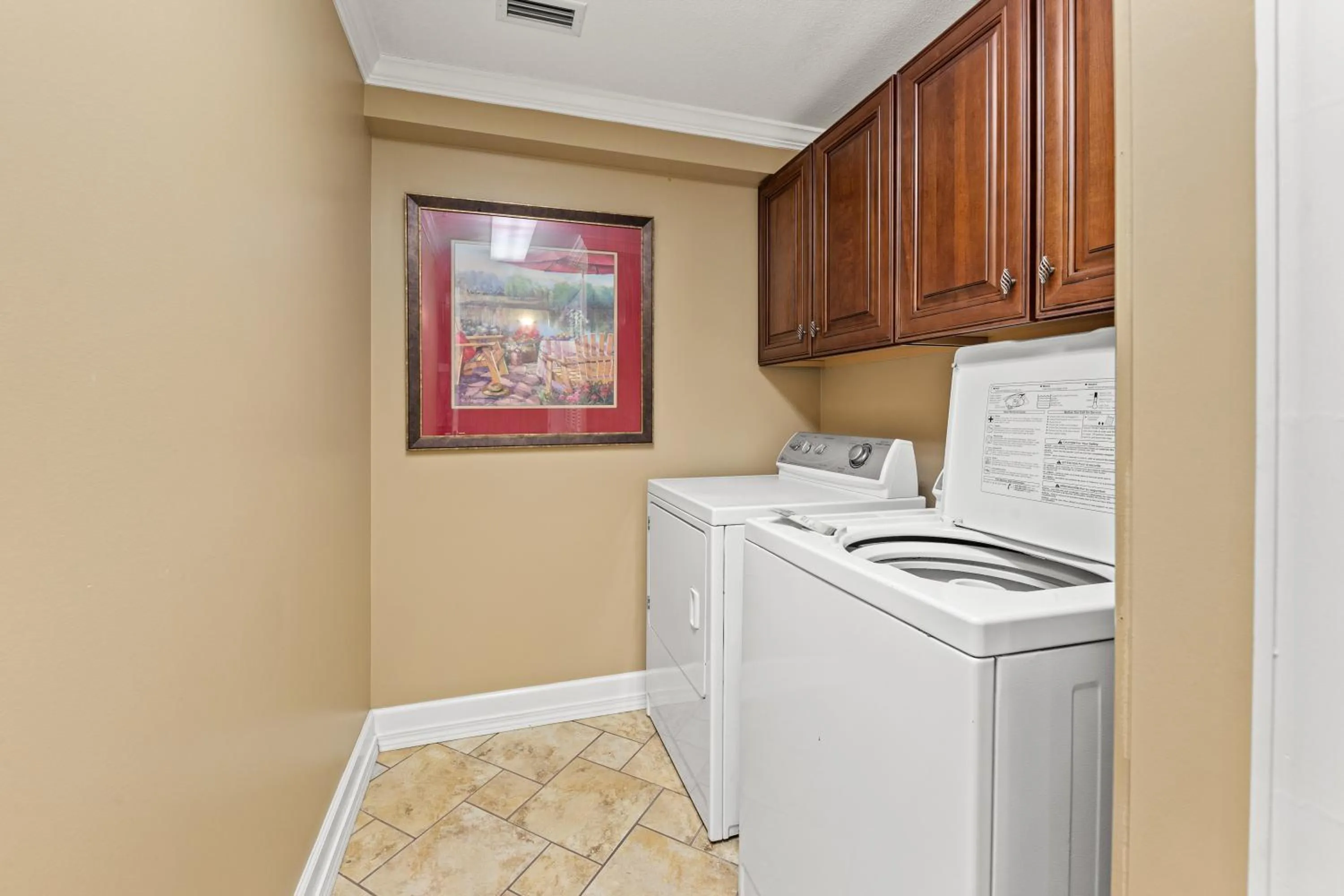 laundry in Gulf Front Master Bedroom, 2 Pools & Hot Tubs, Sleeps 8