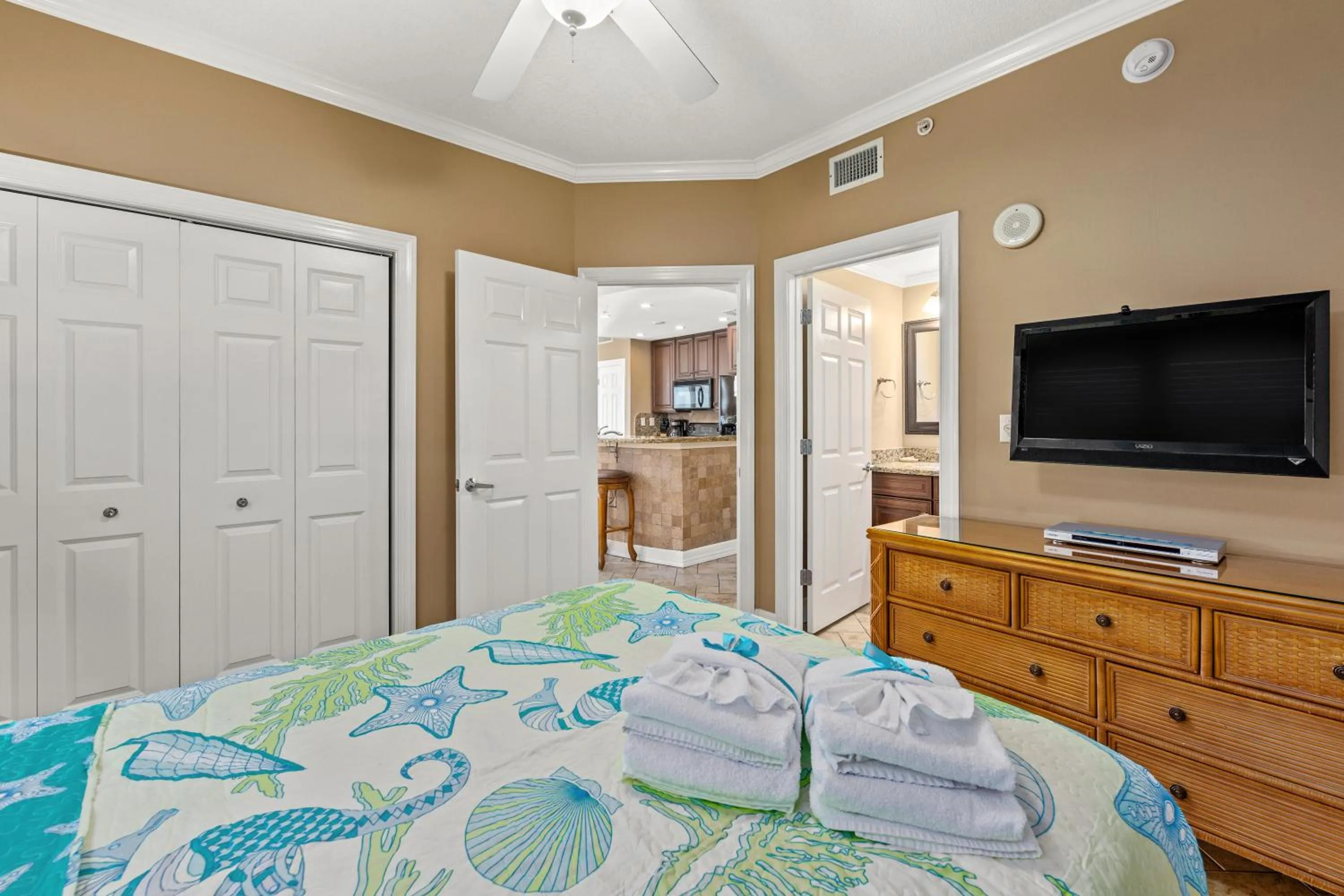 Bed in Gulf Front Master Bedroom, 2 Pools & Hot Tubs, Sleeps 8