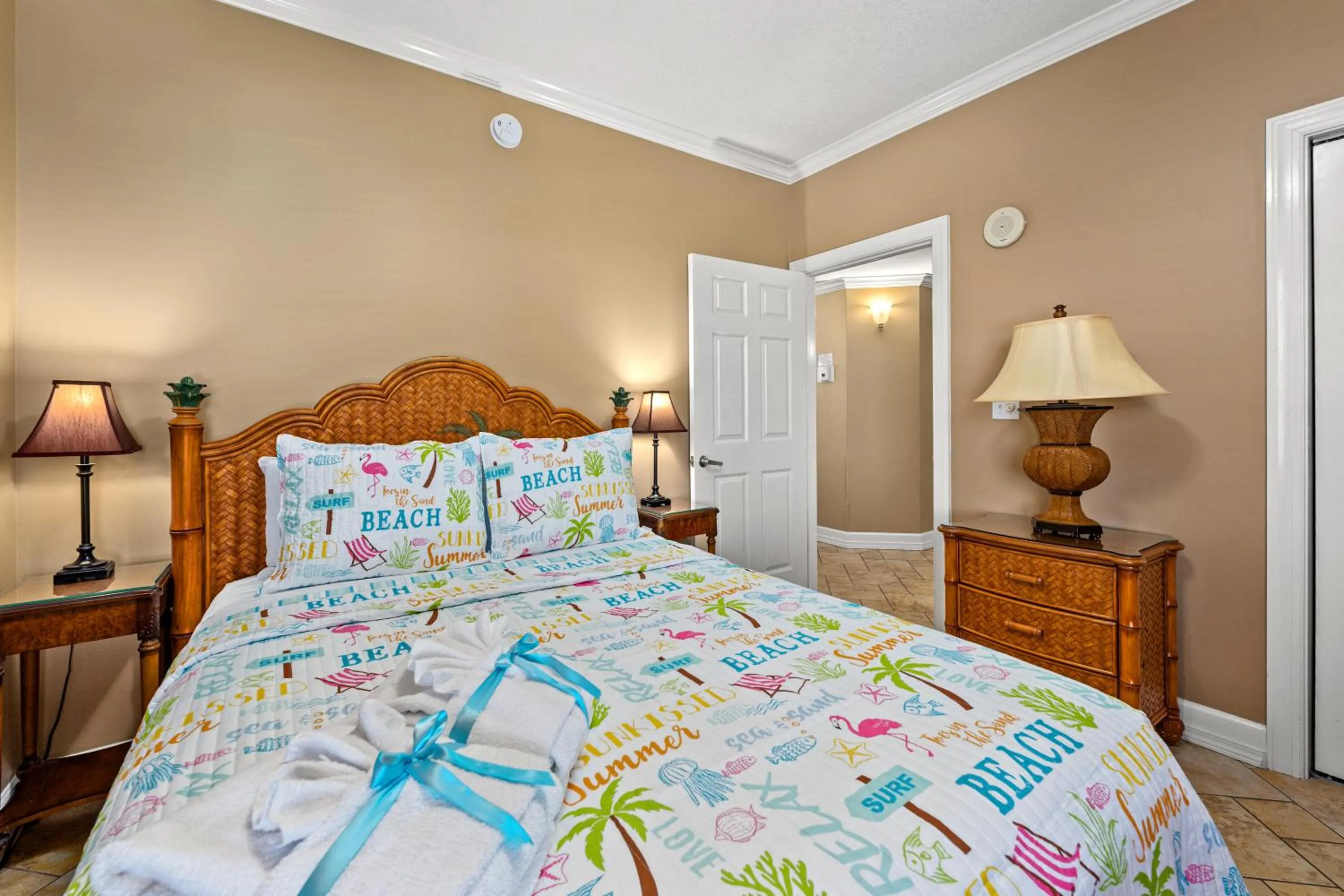 Bed in Gulf Front Master Bedroom, 2 Pools & Hot Tubs, Sleeps 8