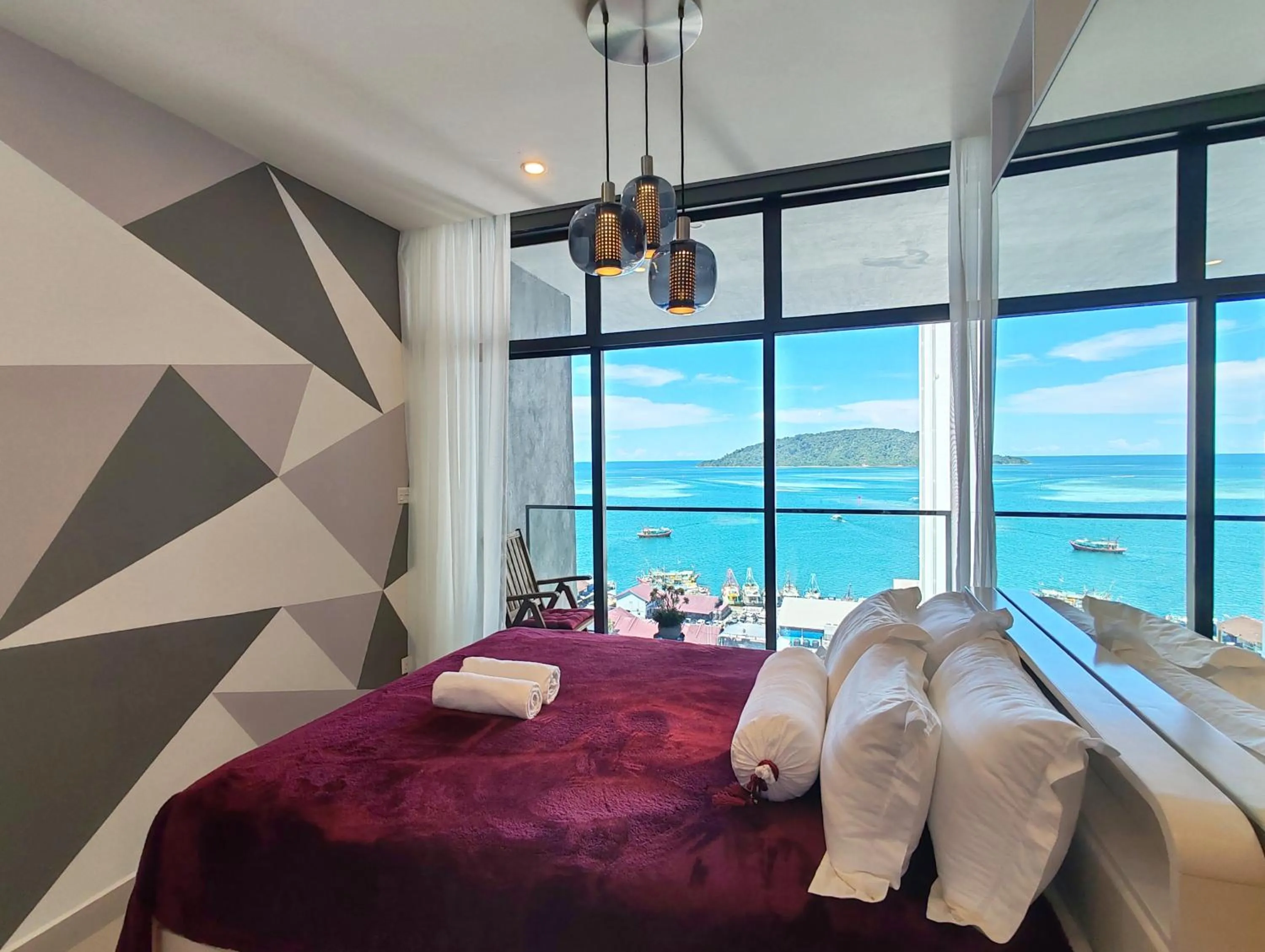 Bed in Seaview Bliss Studio By Tropical Elegance