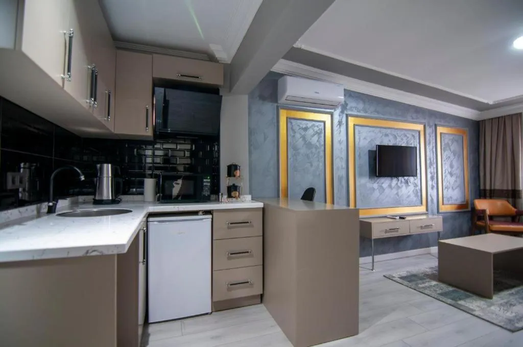 Kitchen or kitchenette in Naif Bey Hotel