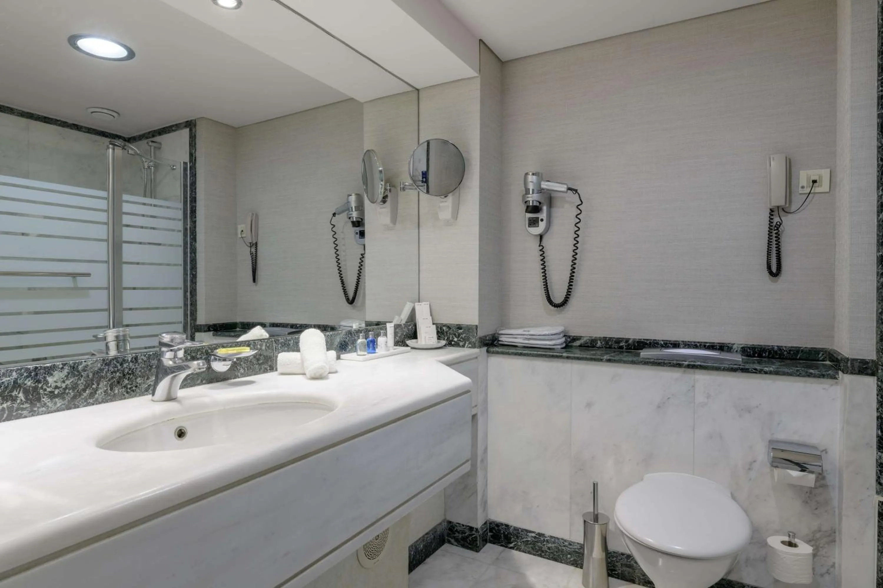 Bathroom in Radisson Blu Park Hotel Athens