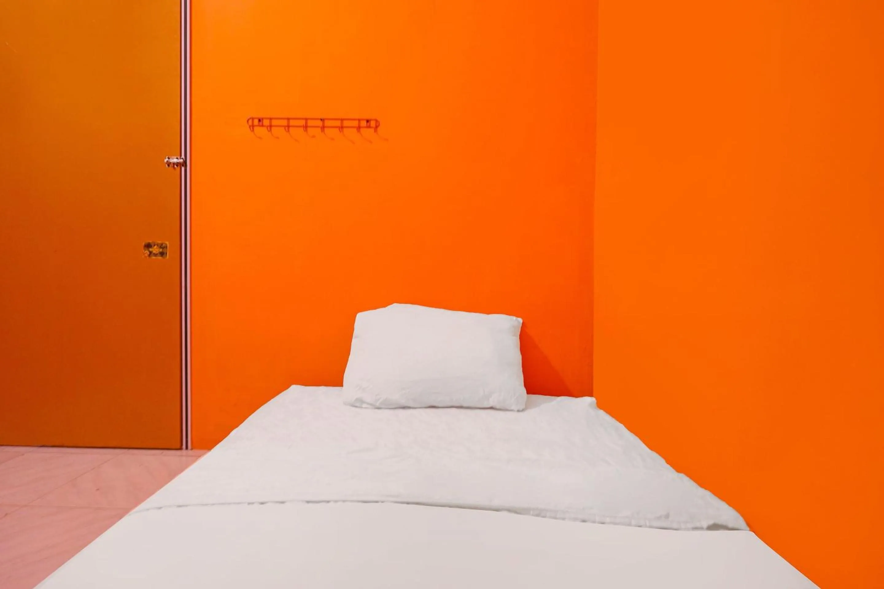 Bedroom, Bed in Hotel O Penginapan ReniNearMall Nagoya Hill