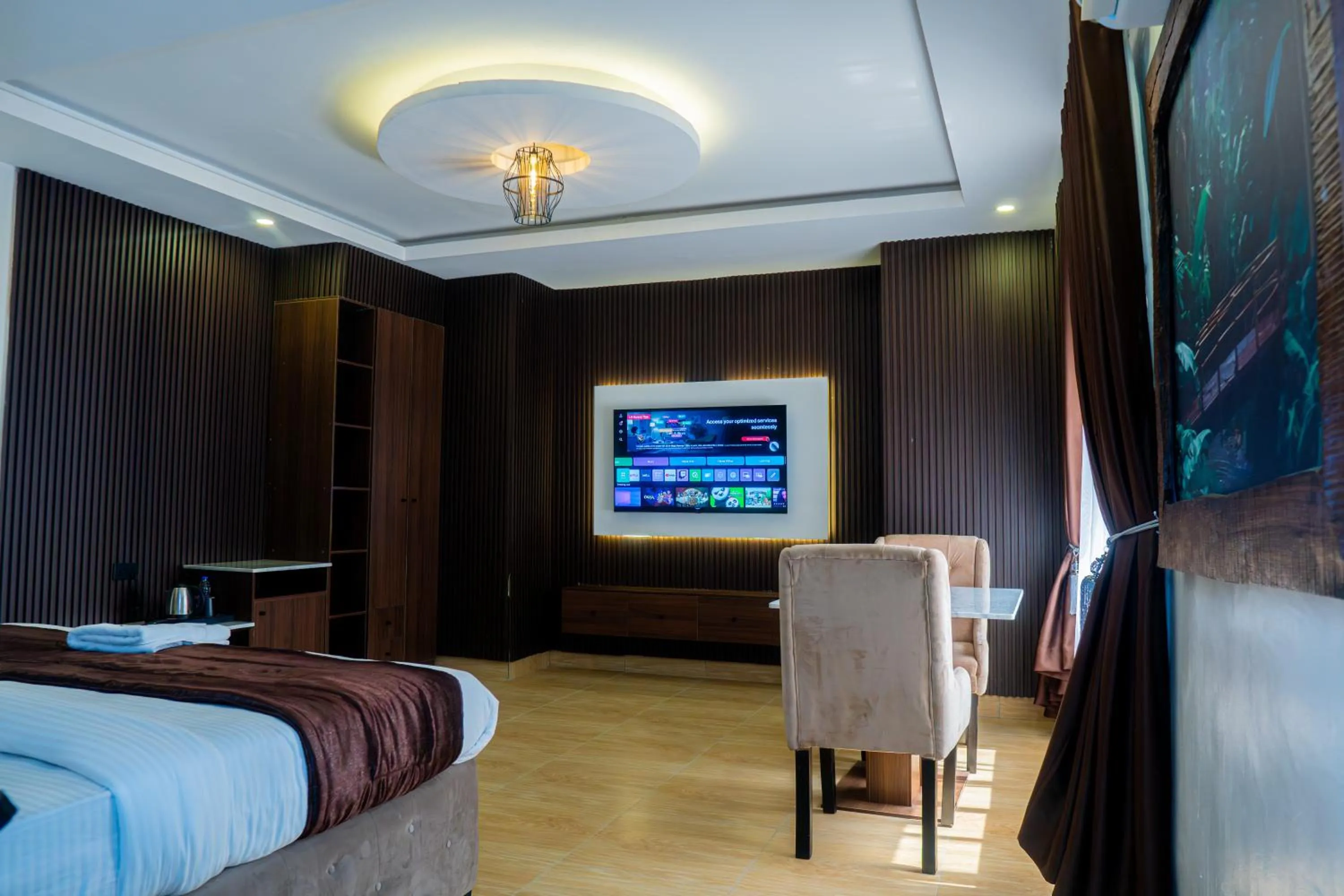 Communal lounge/ TV room in Presken Hotel Residence, GRA Ikeja, Lagos